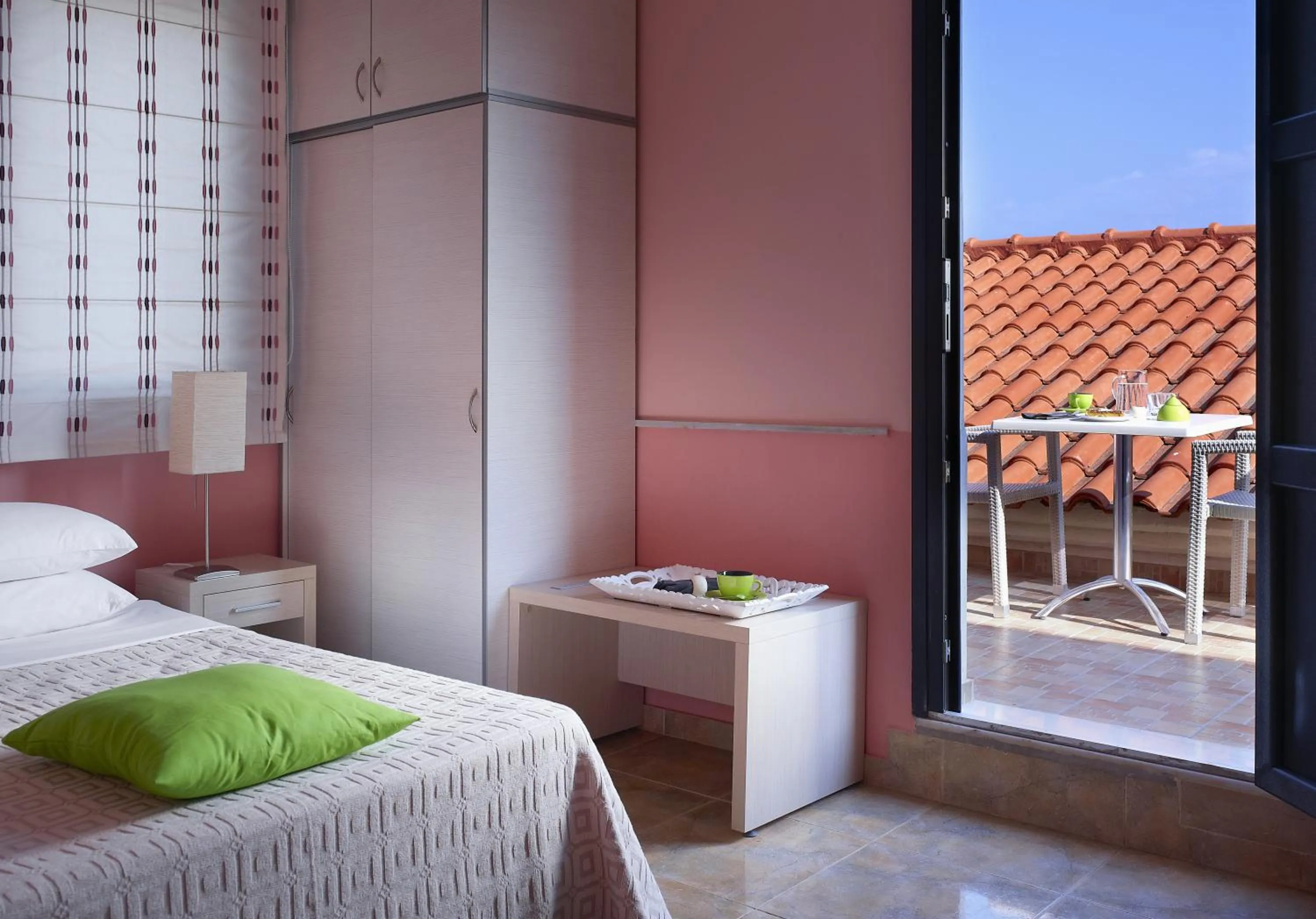 Bed in Aeolis Apartments & Studios