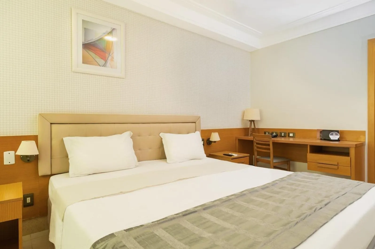 Bed in Royal Macaé Palace Hotel