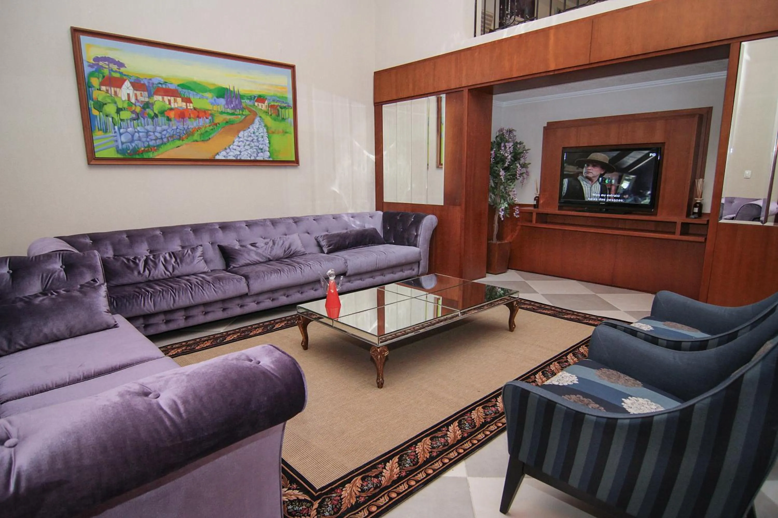 Communal lounge/ TV room in Life Hotel Infinity