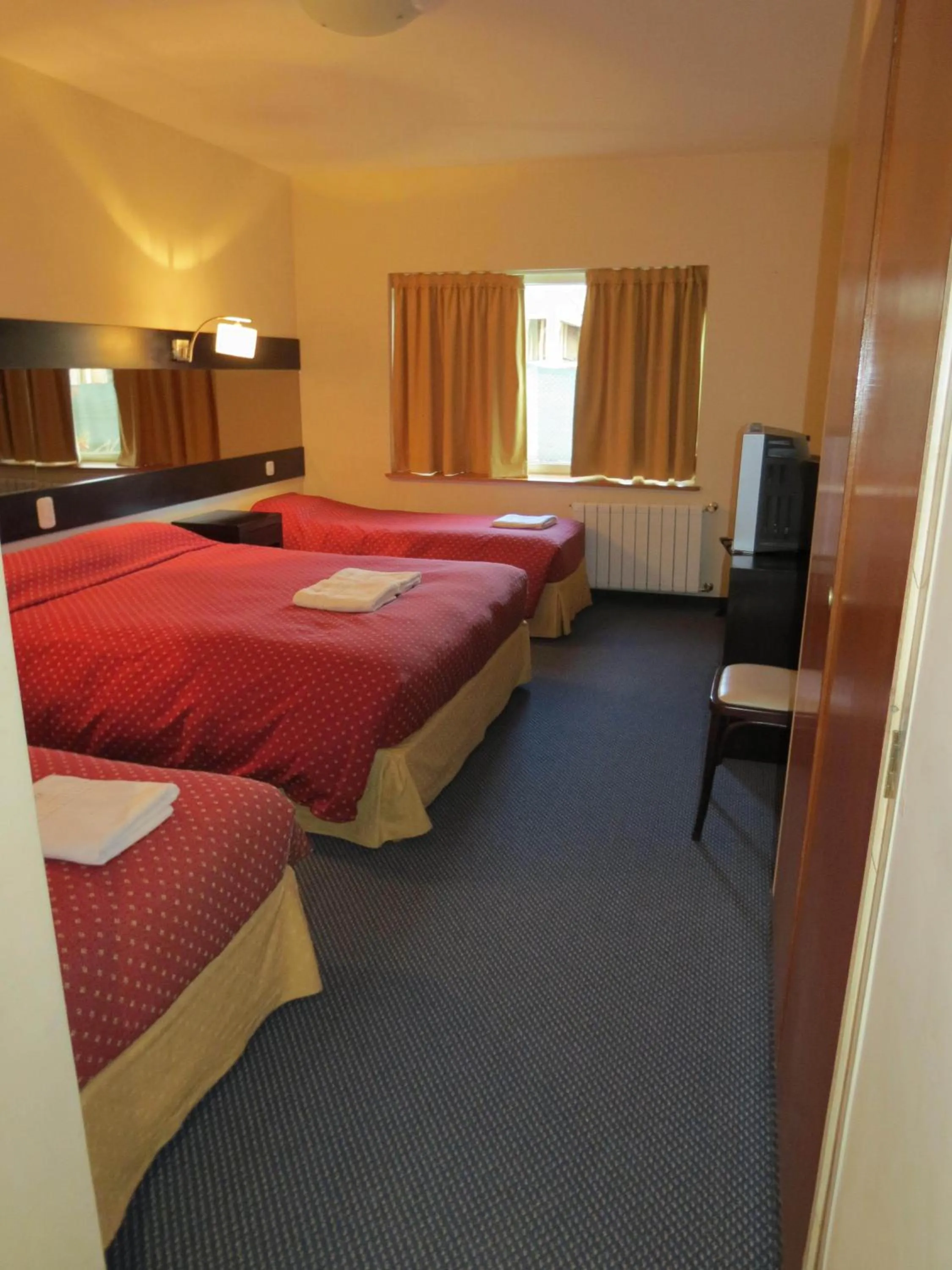 Photo of the whole room, Bed in Marcopolo Suites Calafate