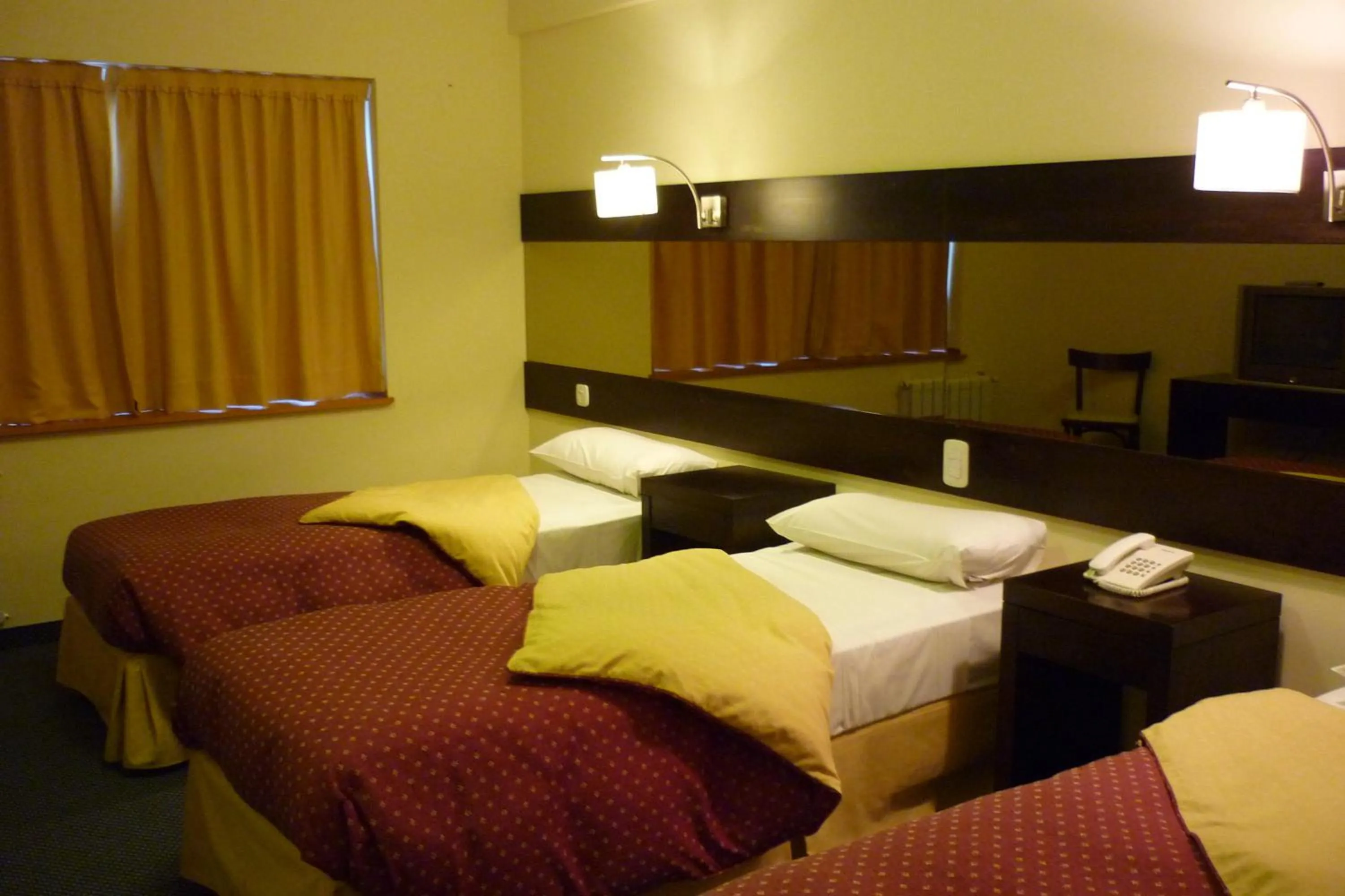 Photo of the whole room, Bed in Marcopolo Suites Calafate