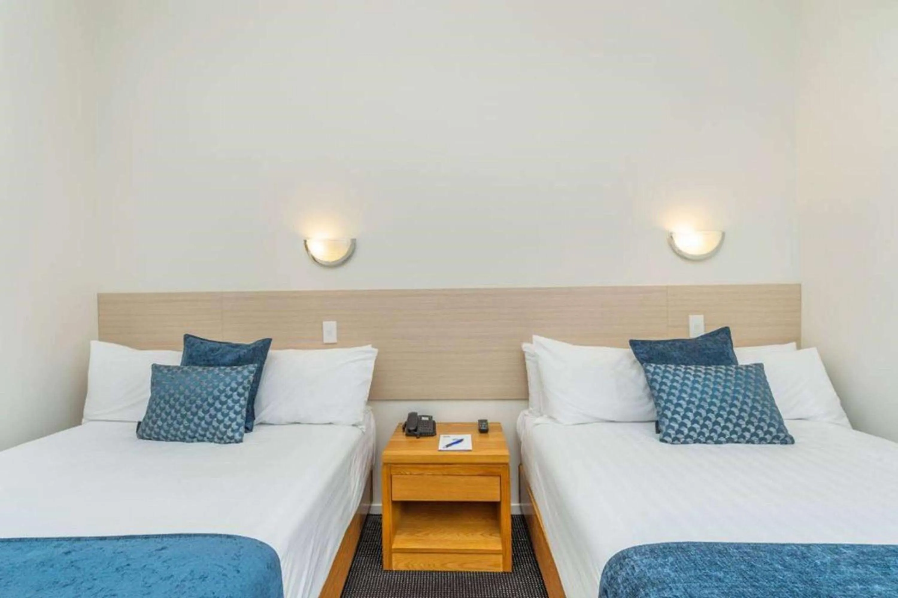 Photo of the whole room, Bed in Ramada by Wyndham, Hamilton City Center