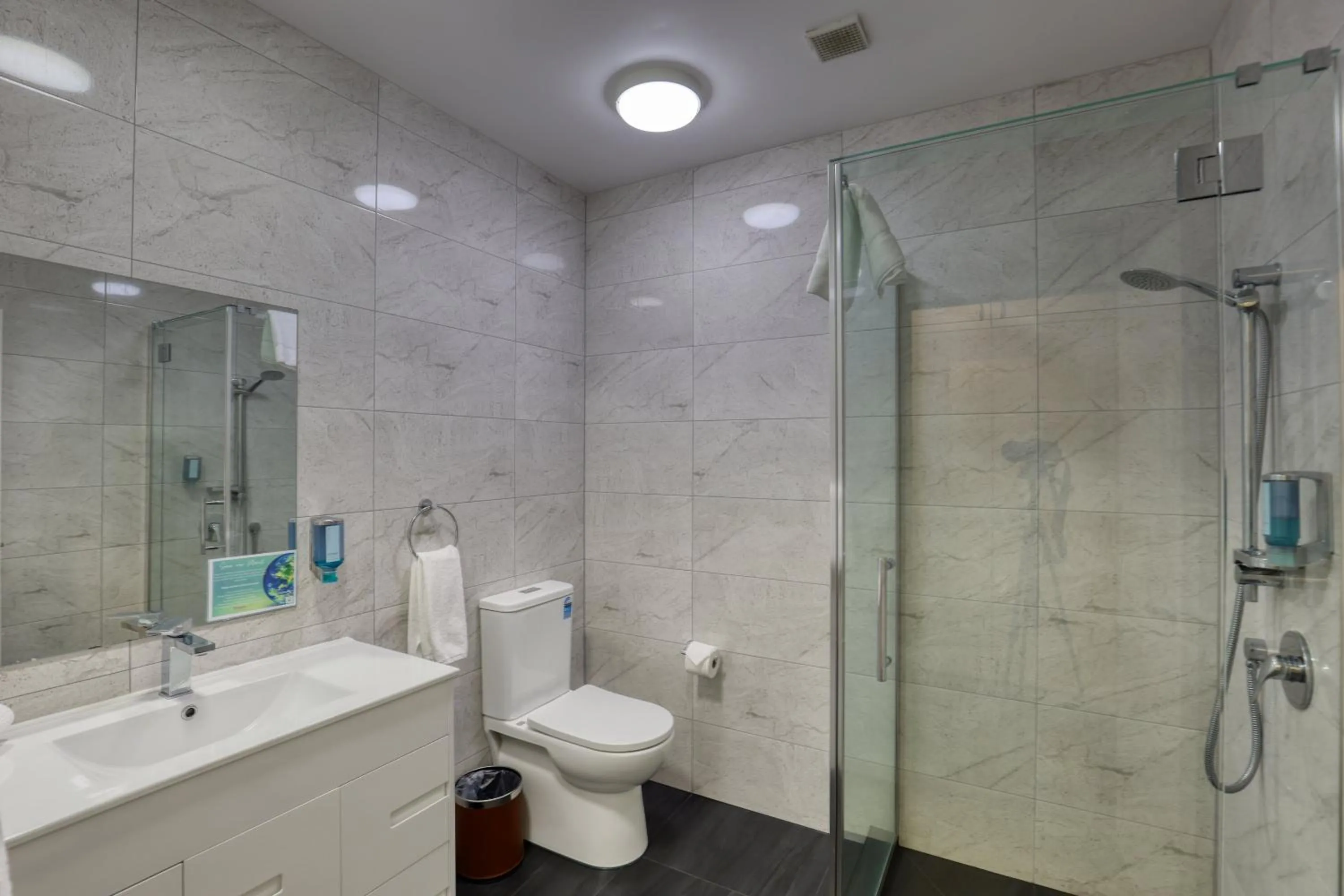 Bathroom in Ramada by Wyndham, Hamilton City Center