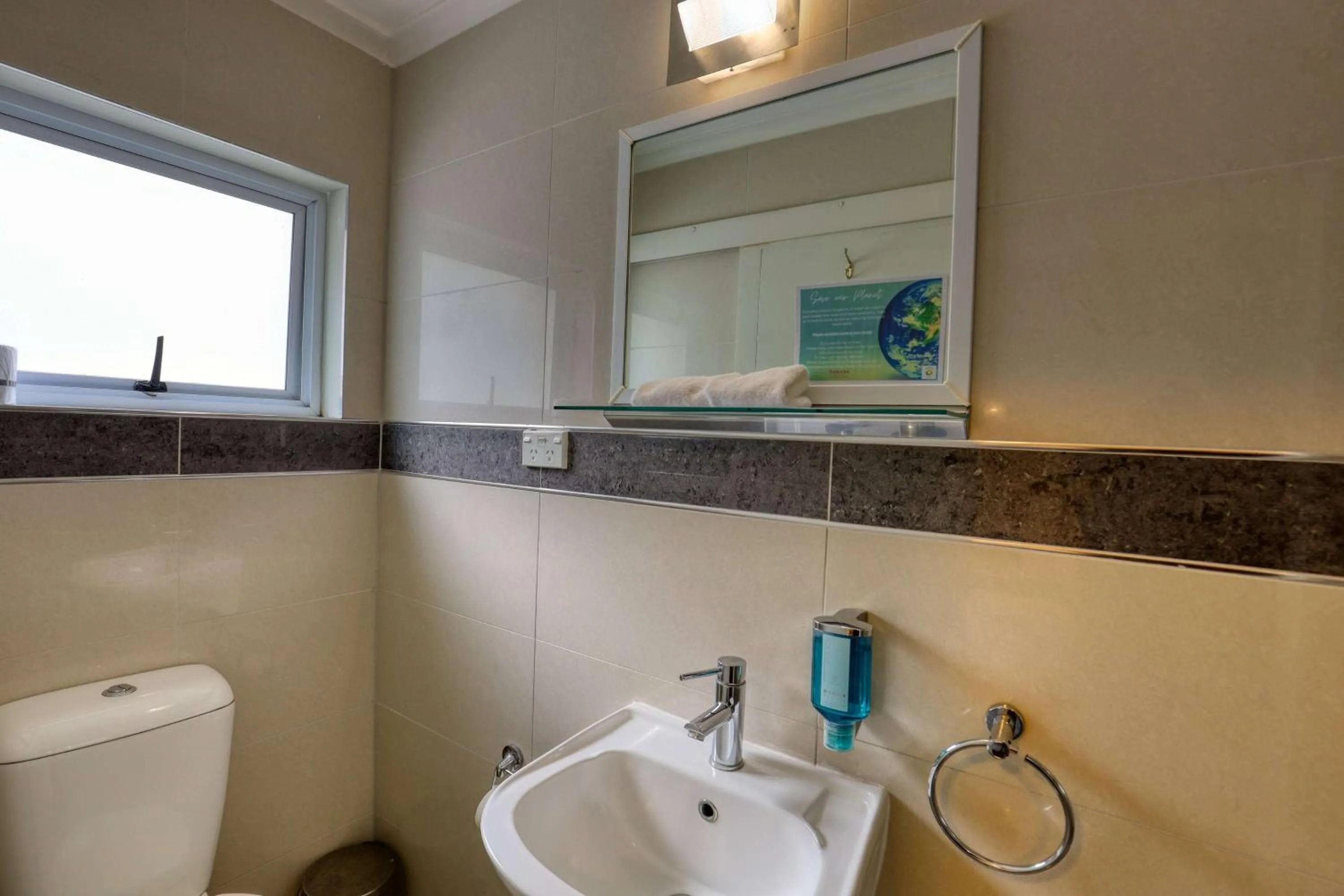 Bathroom in Ramada by Wyndham, Hamilton City Center