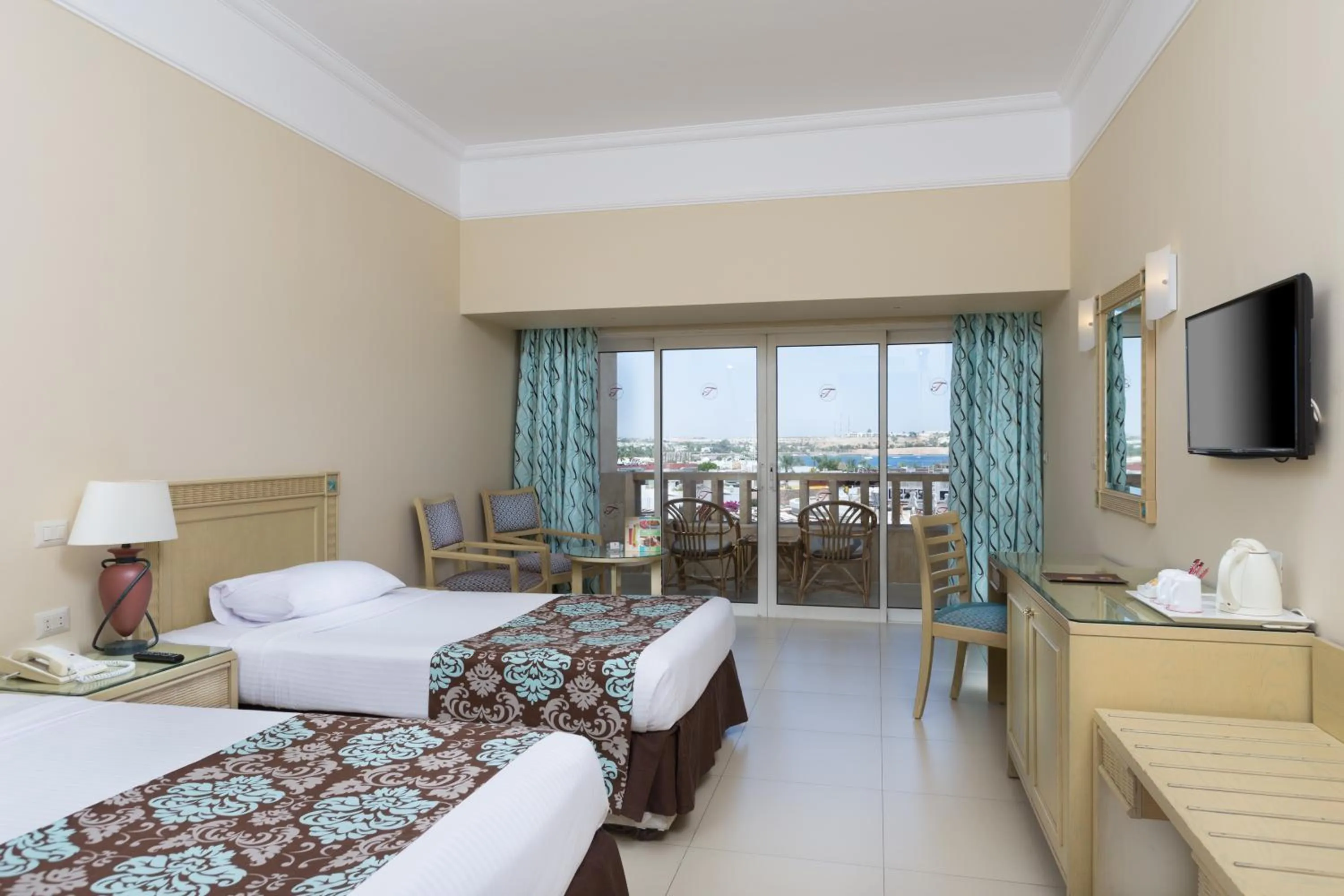 Photo of the whole room, Bed in Naama Bay Hotel & Resort