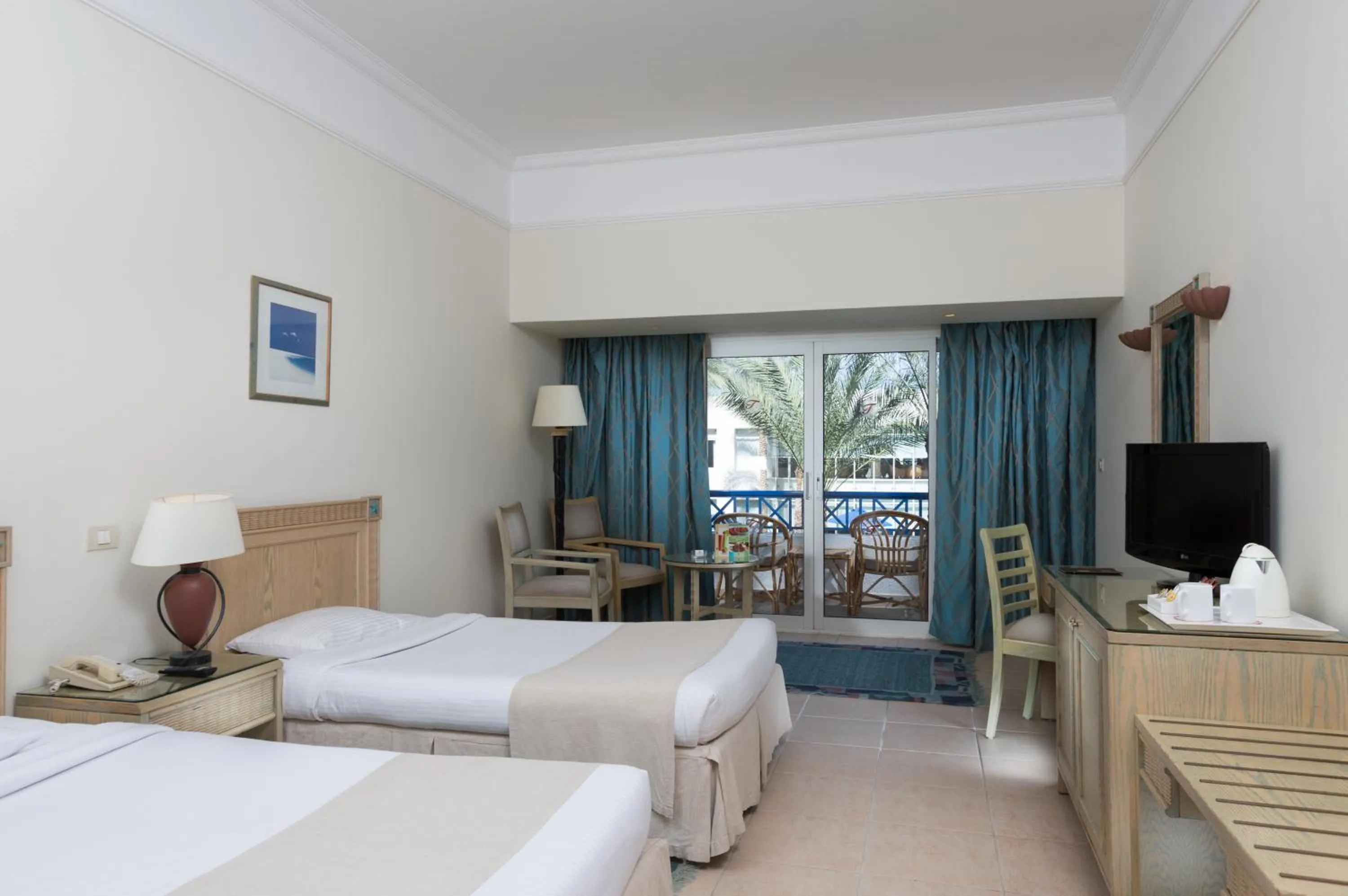 Photo of the whole room, Bed in Naama Bay Hotel & Resort