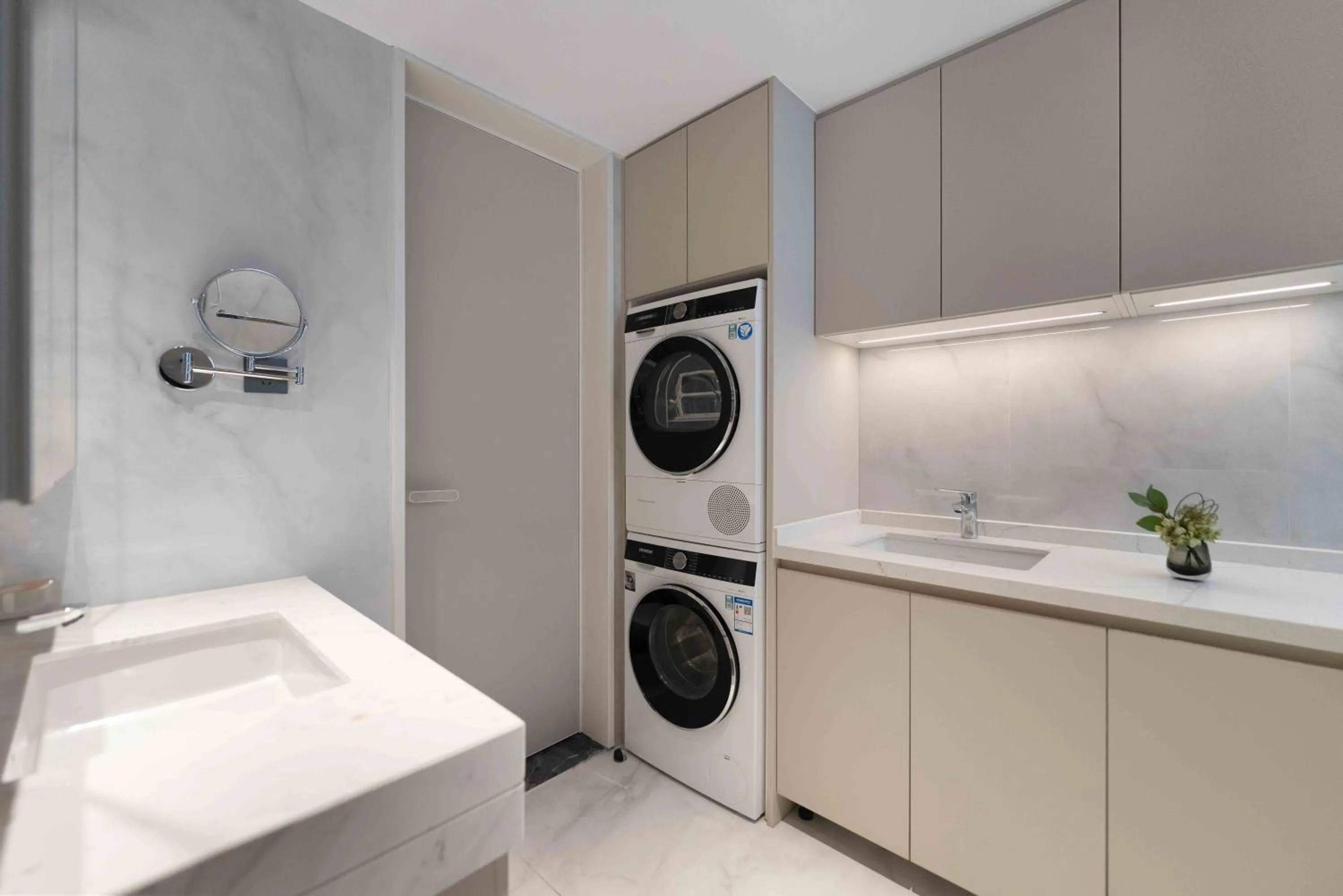 washing machine in CM+ Service Apartment Shenzhen Taige