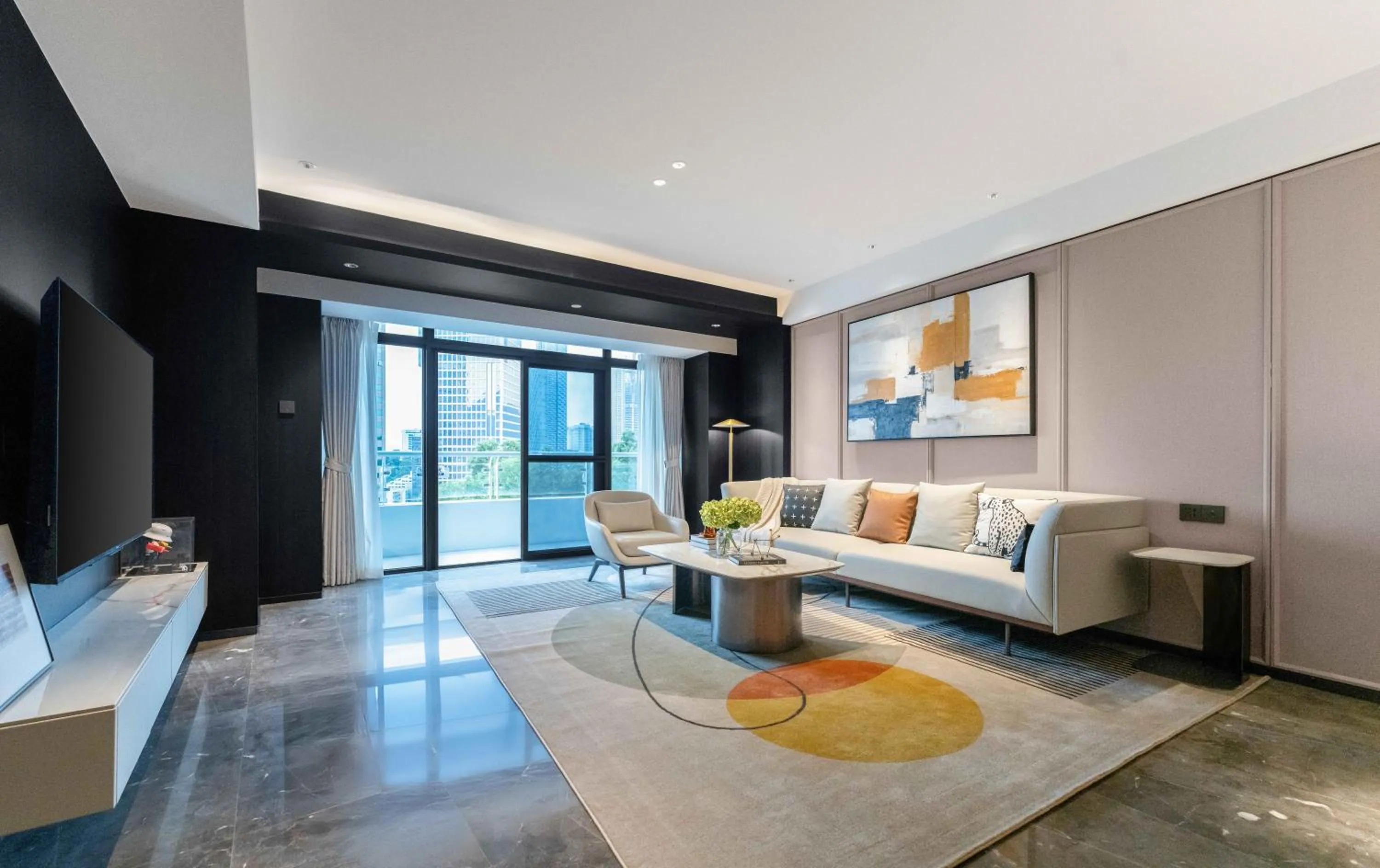Living room in CM+ Service Apartment Shenzhen Taige