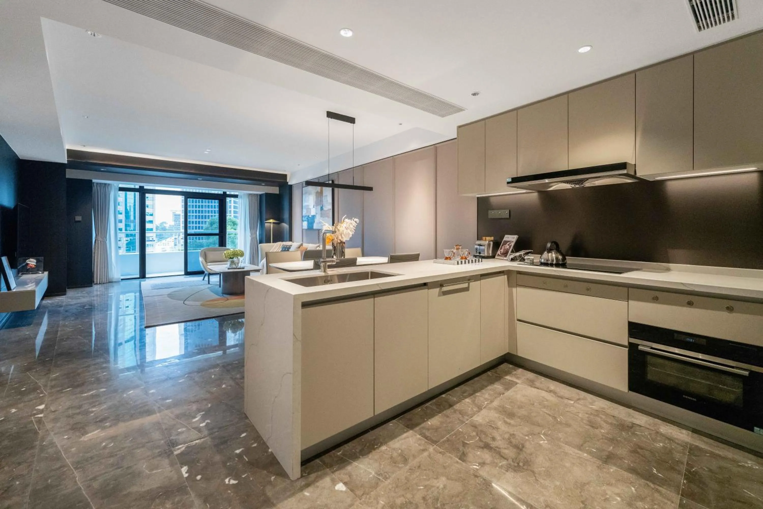 Kitchen or kitchenette in CM+ Service Apartment Shenzhen Taige