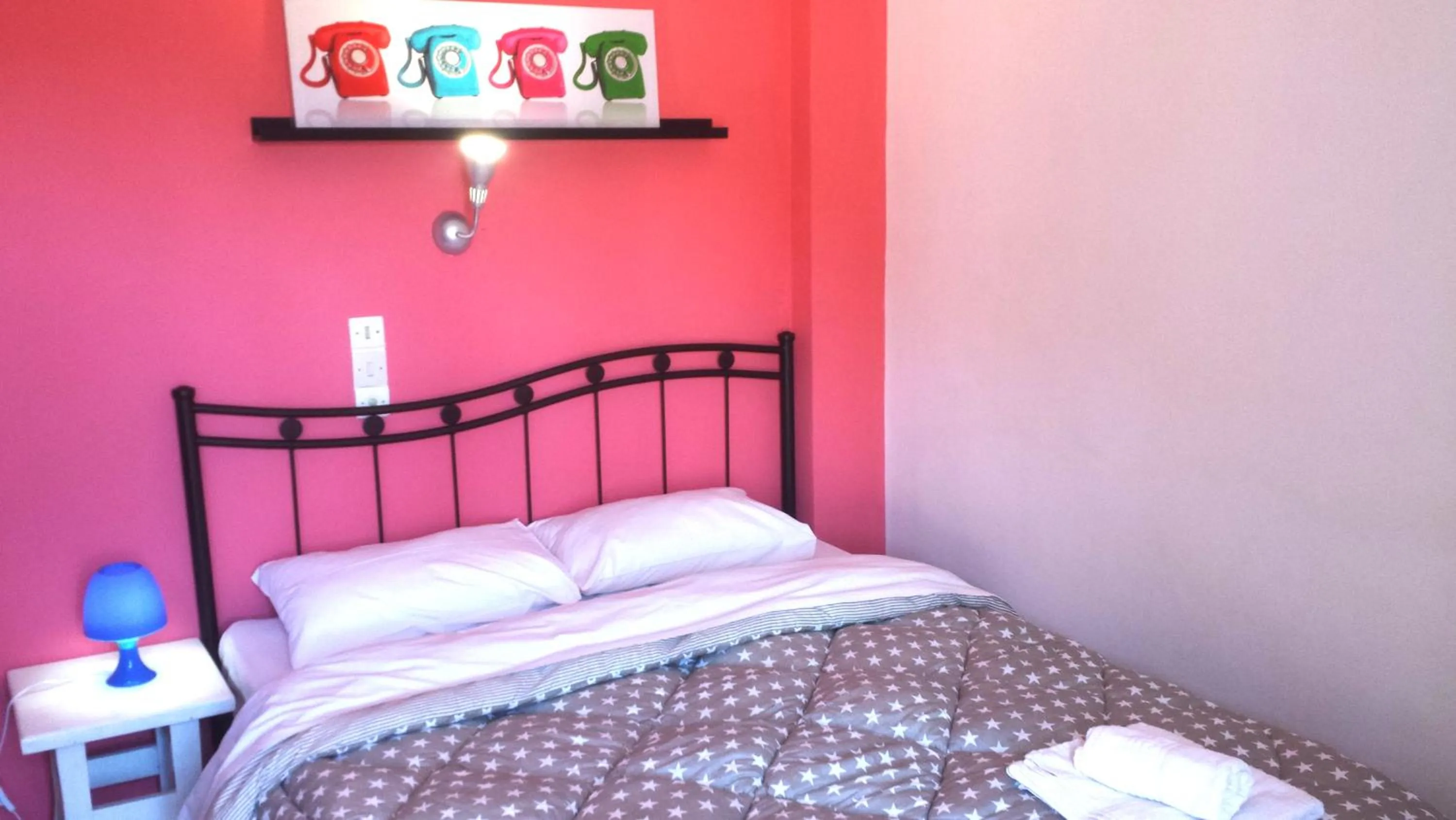 Bed in Avra Budget Beach Rooms