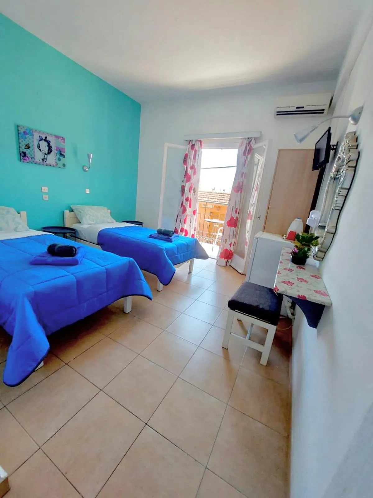 Bed in Avra Budget Beach Rooms