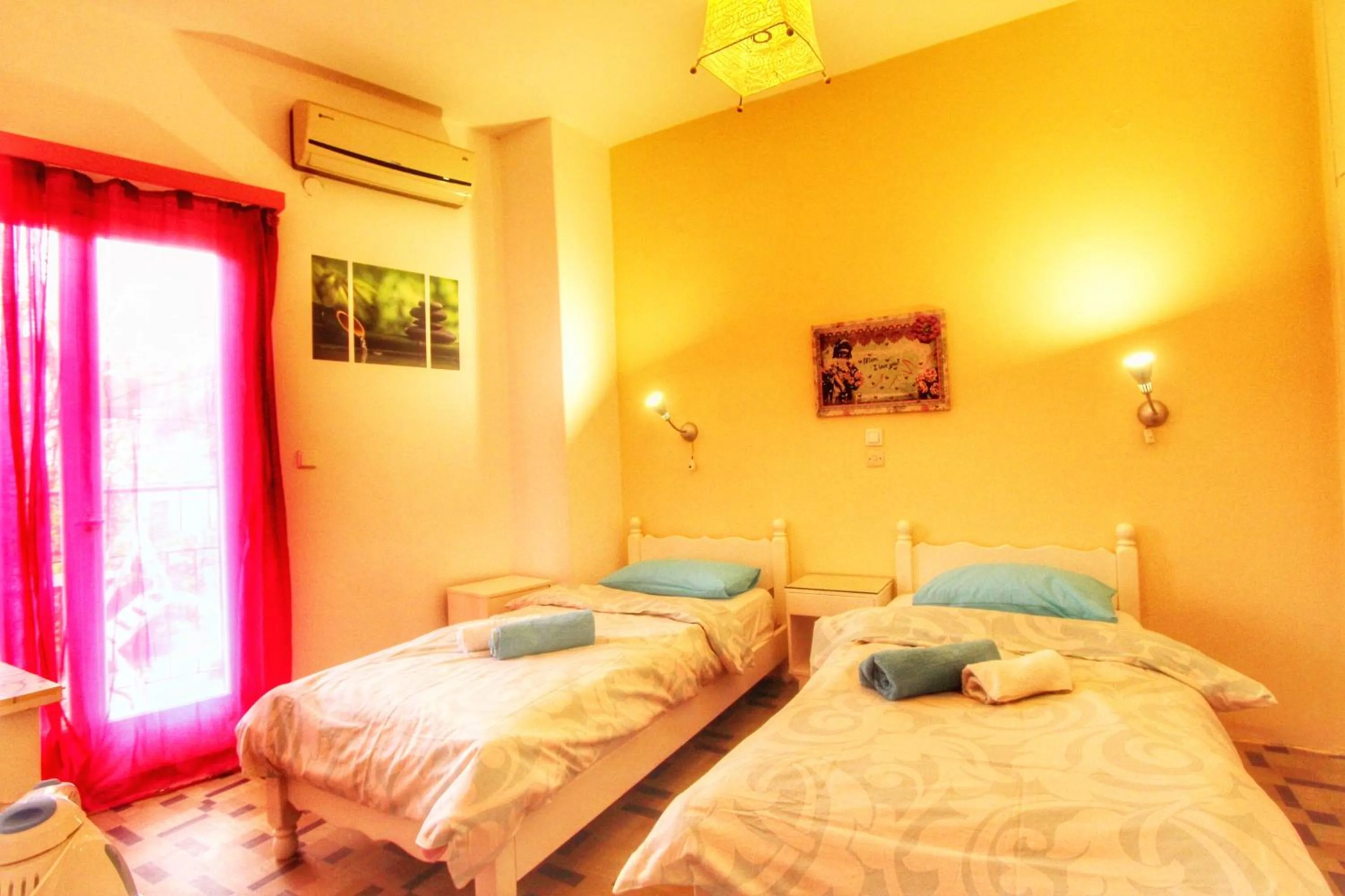 Bed in Avra Budget Beach Rooms