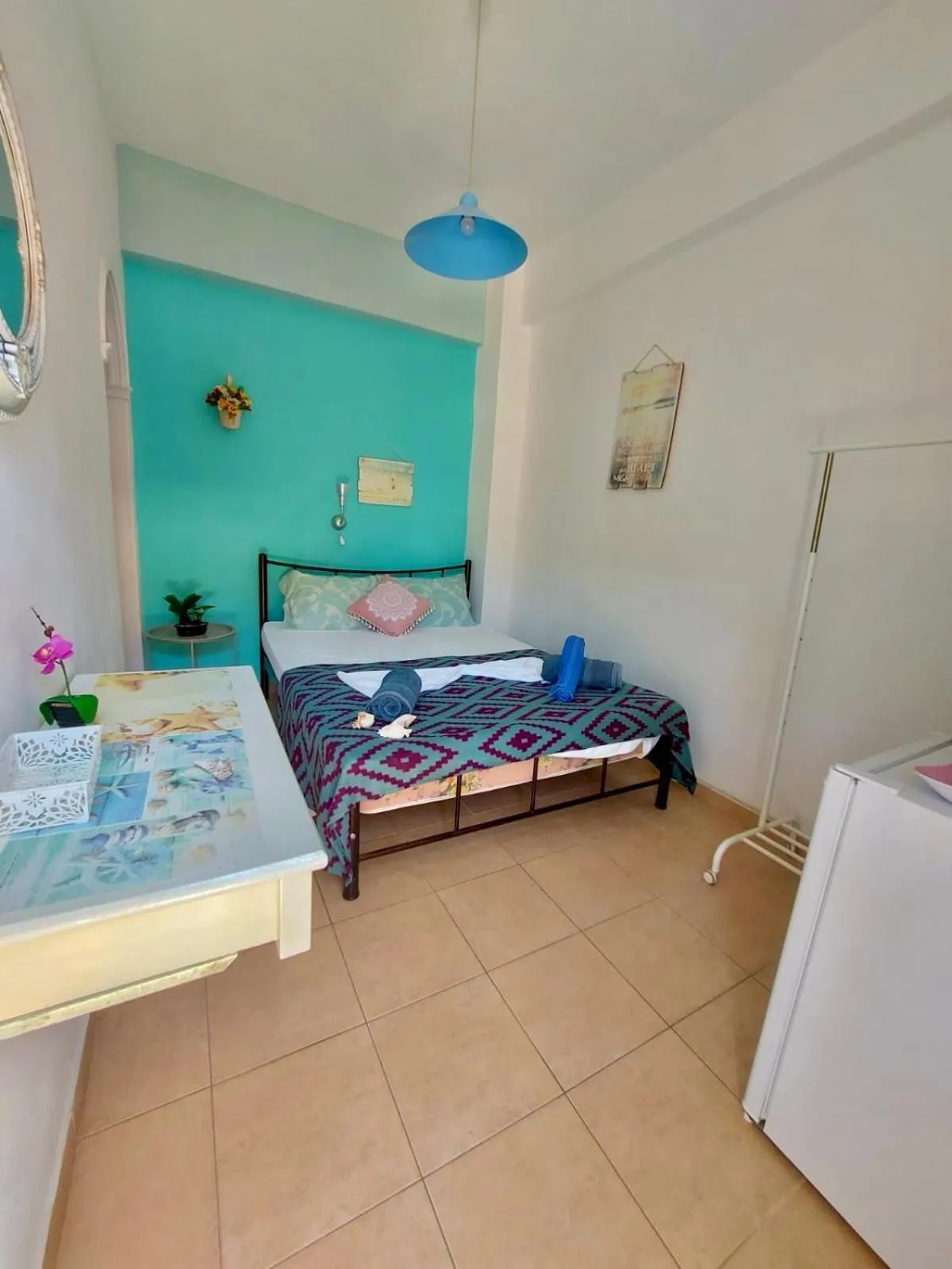 Bed in Avra Budget Beach Rooms