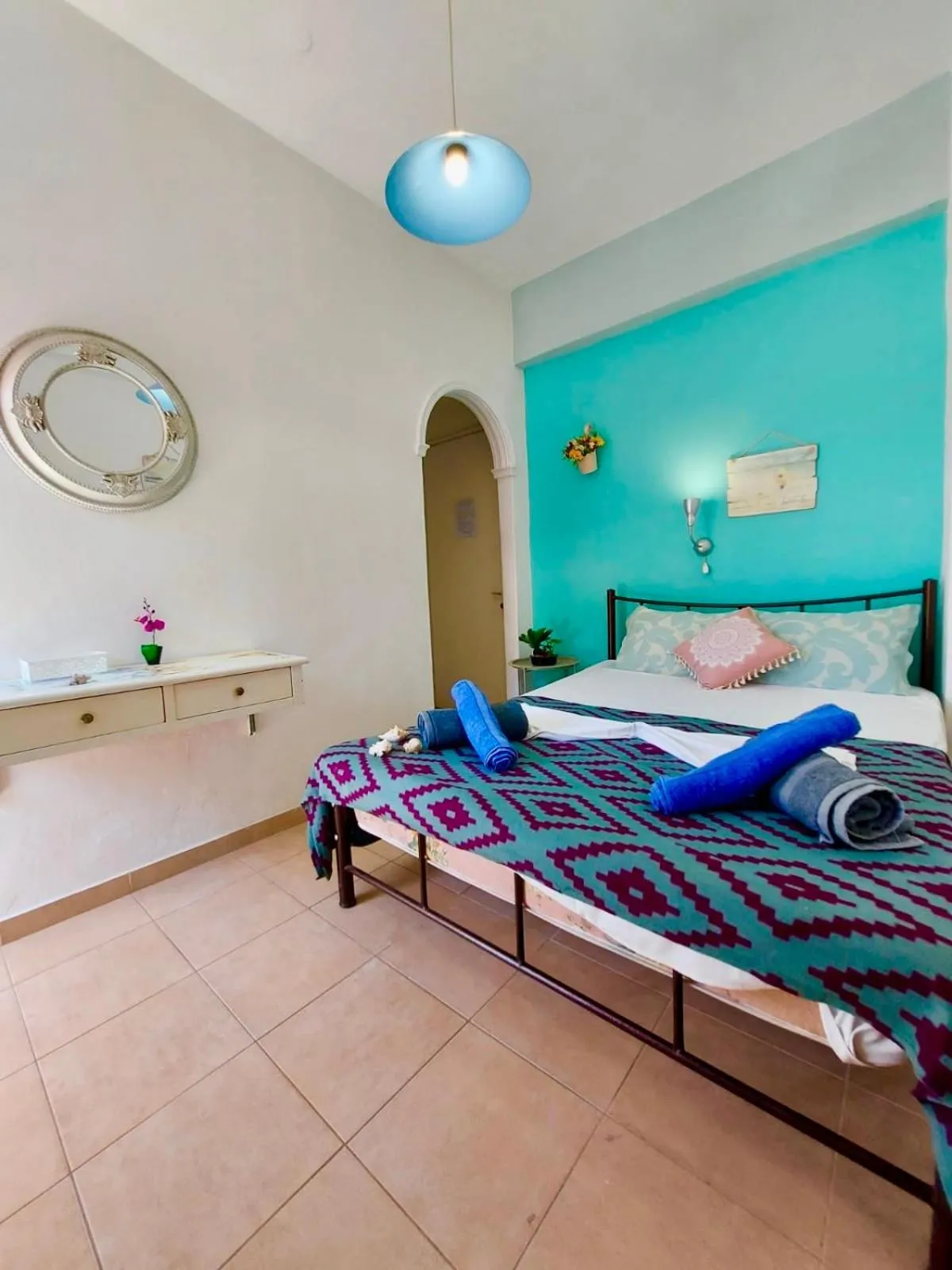 Bed in Avra Budget Beach Rooms
