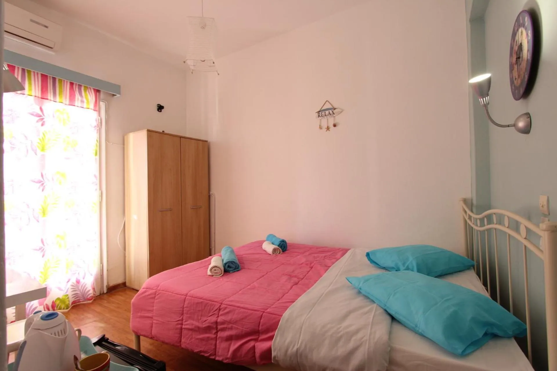 Bed in Avra Budget Beach Rooms