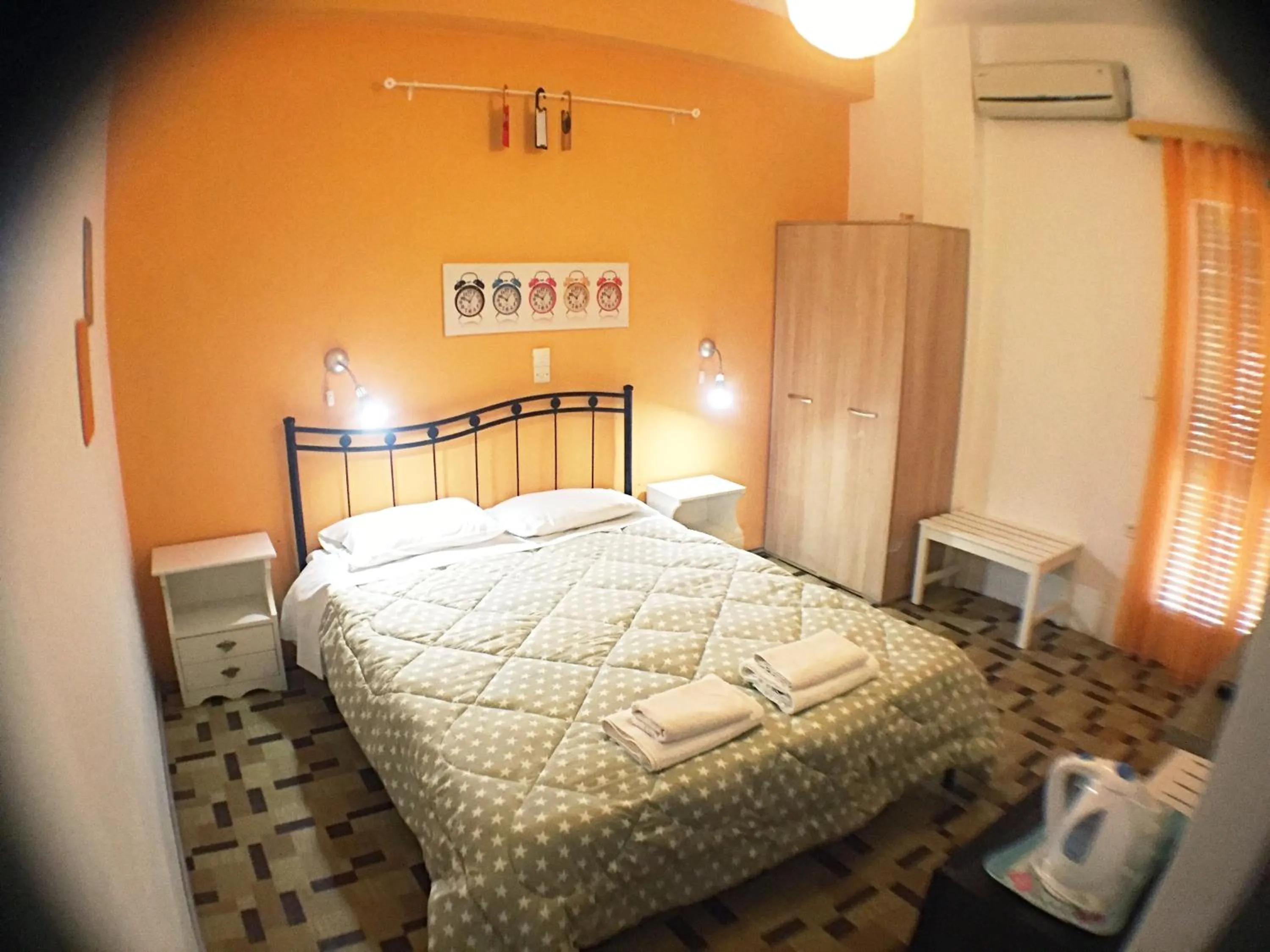 Bedroom in Avra Budget Beach Rooms