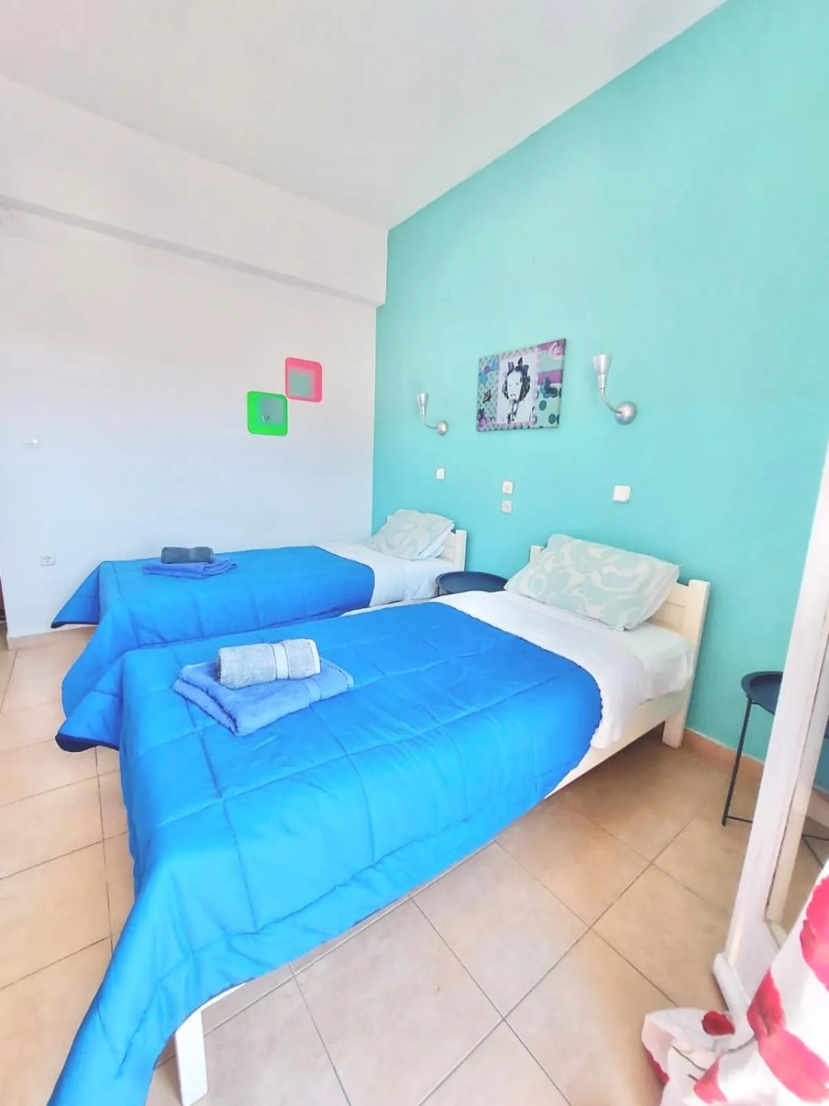 Bed in Avra Budget Beach Rooms