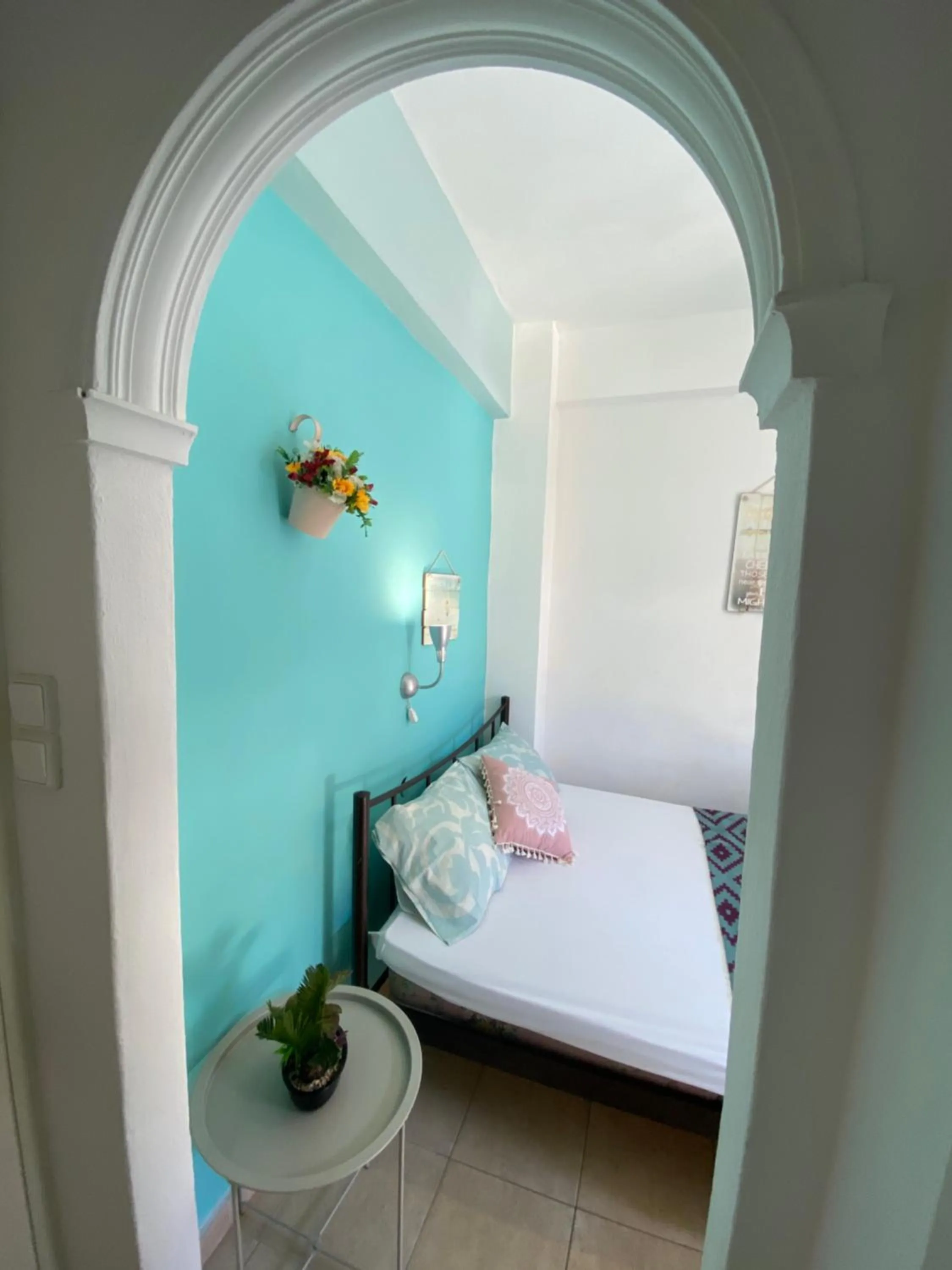 Bed in Avra Budget Beach Rooms