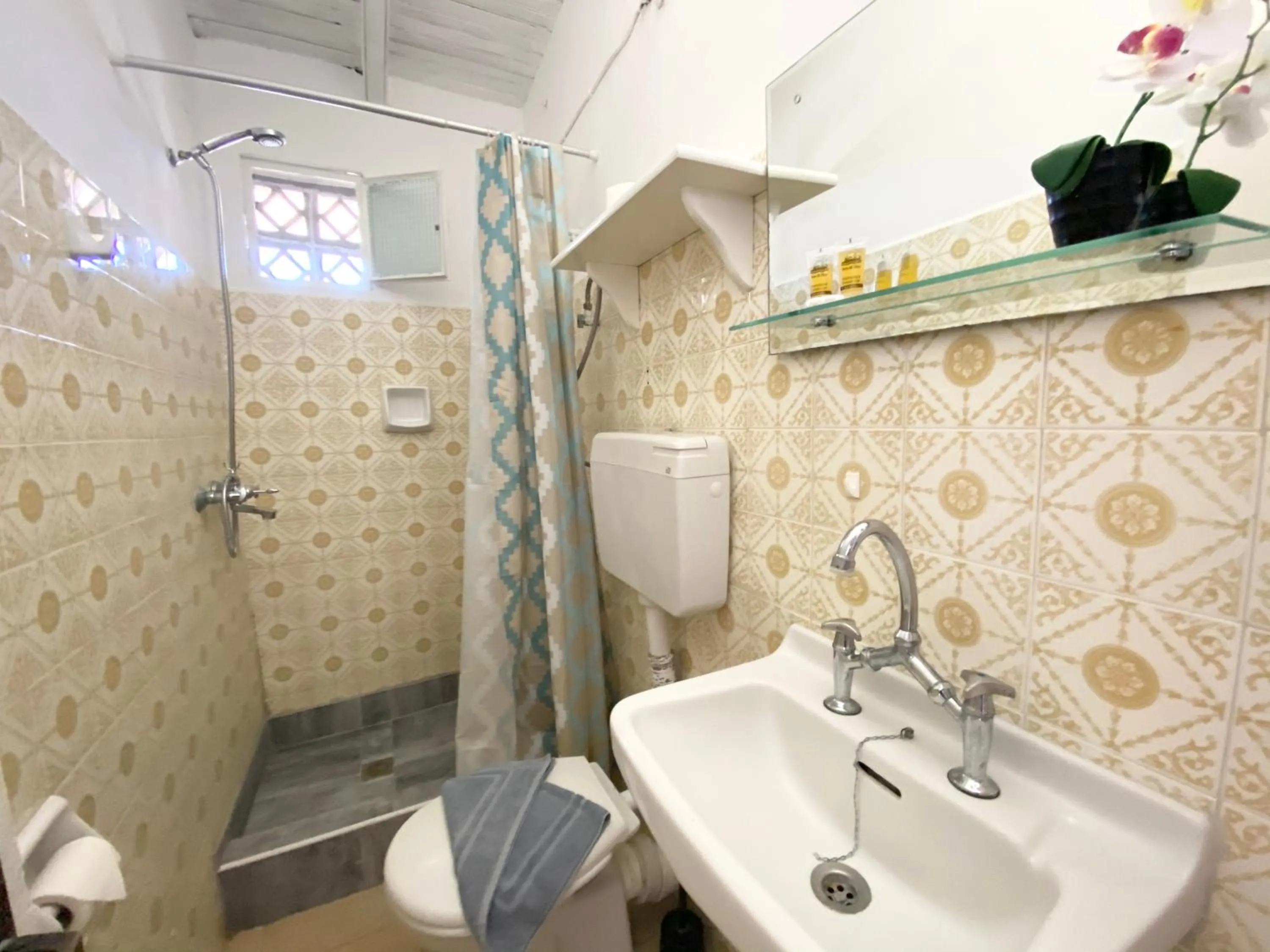 Bathroom in Avra Budget Beach Rooms
