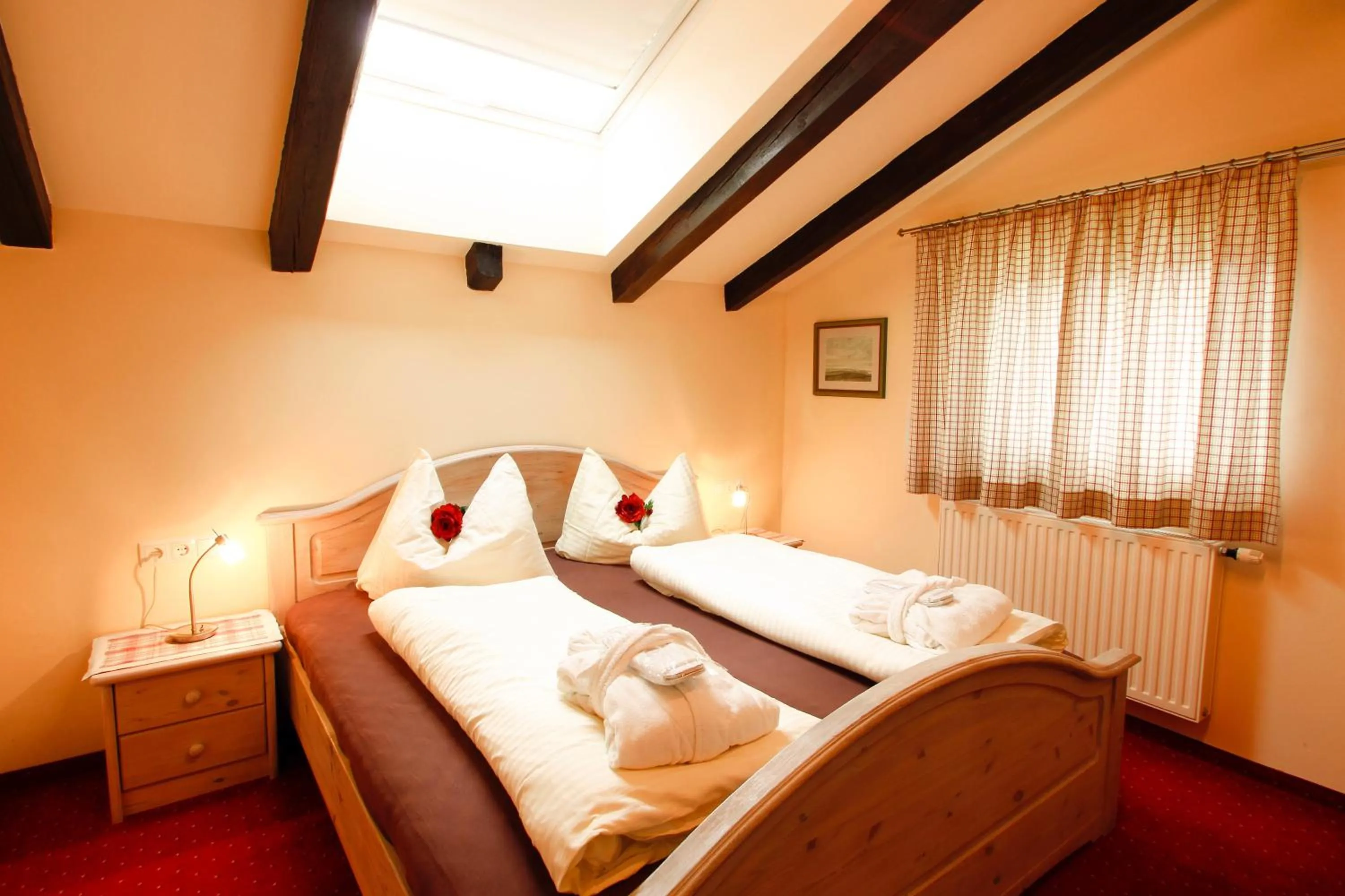 Bed in Alpenlandhaus Menardi
