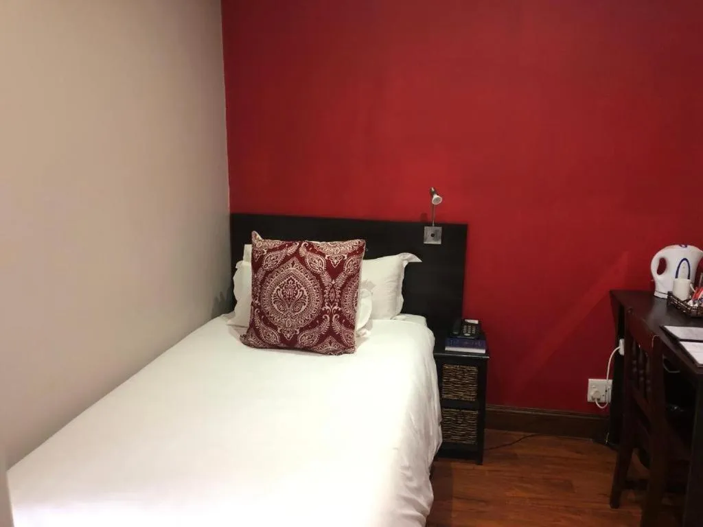 Bed in 314 on Clark Guest House