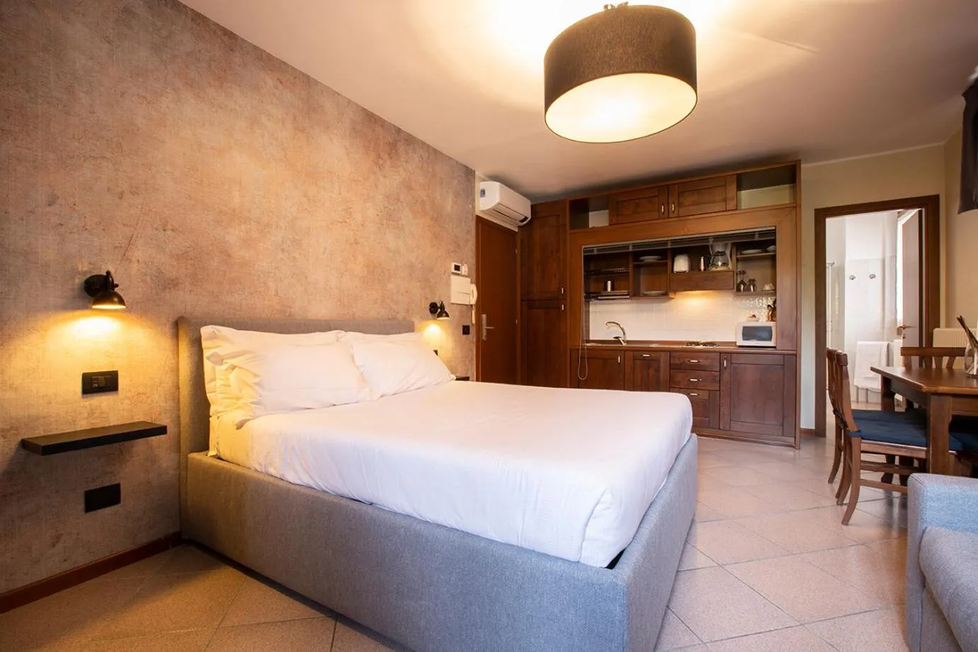 Bed in Antico Pozzo Apartment