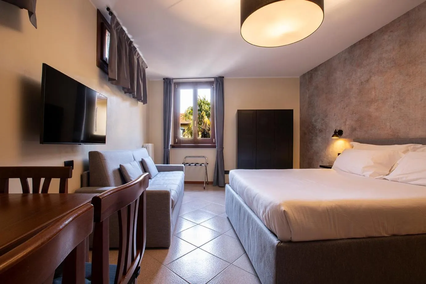 Bed in Antico Pozzo Apartment