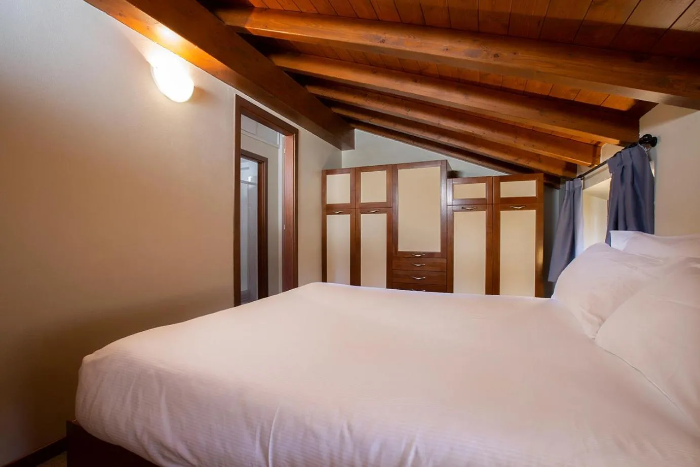 Bed in Antico Pozzo Apartment