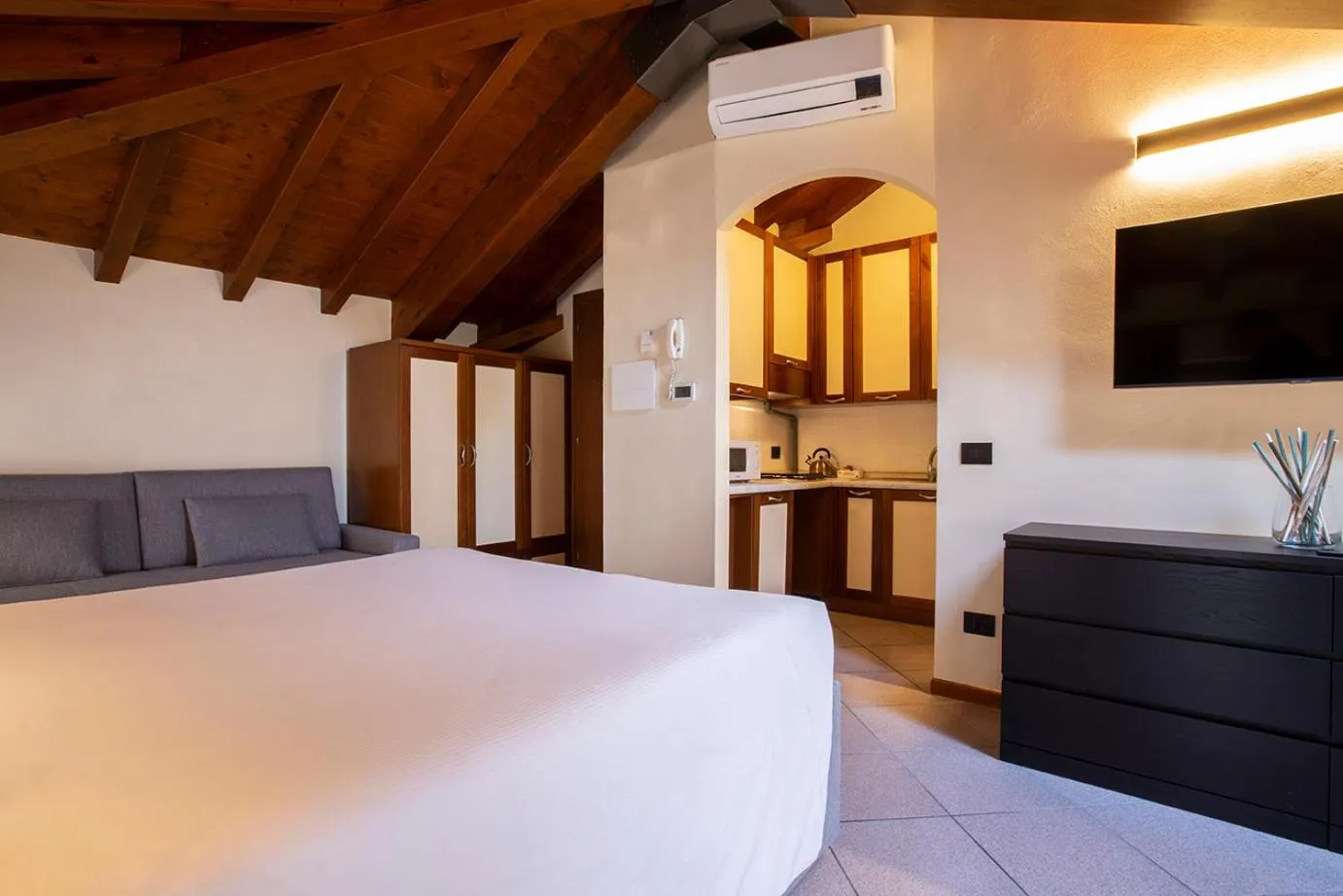 Bed in Antico Pozzo Apartment