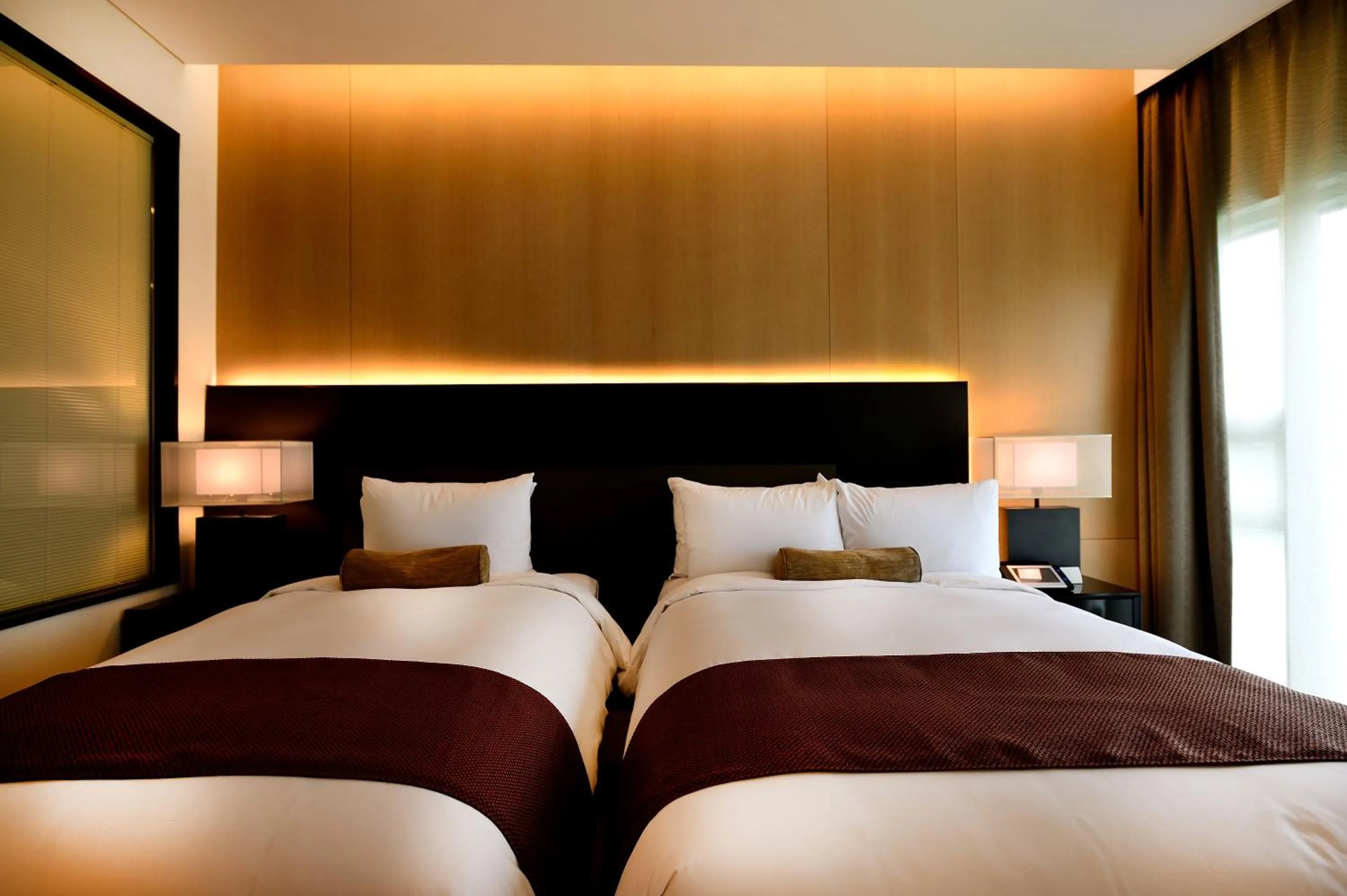 Bed in Midas Hotel & Resort