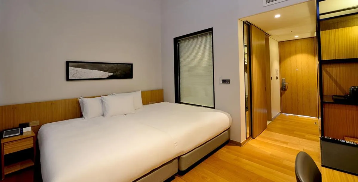 Bed in Midas Hotel & Resort