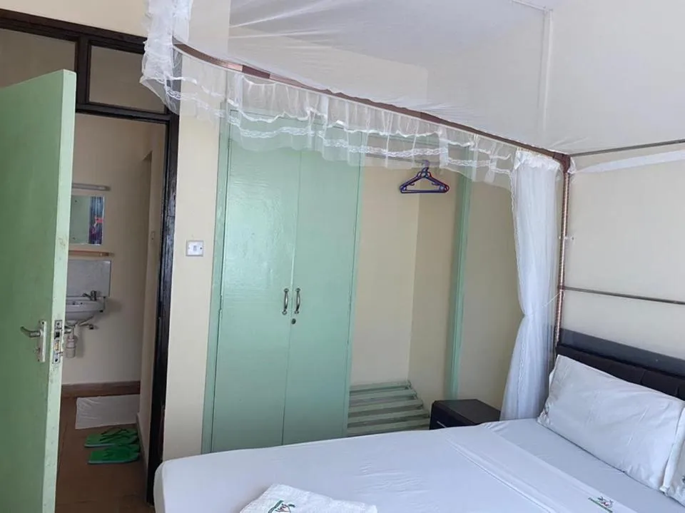 Bedroom, Bed in Merry Villa Hotel & Apartments