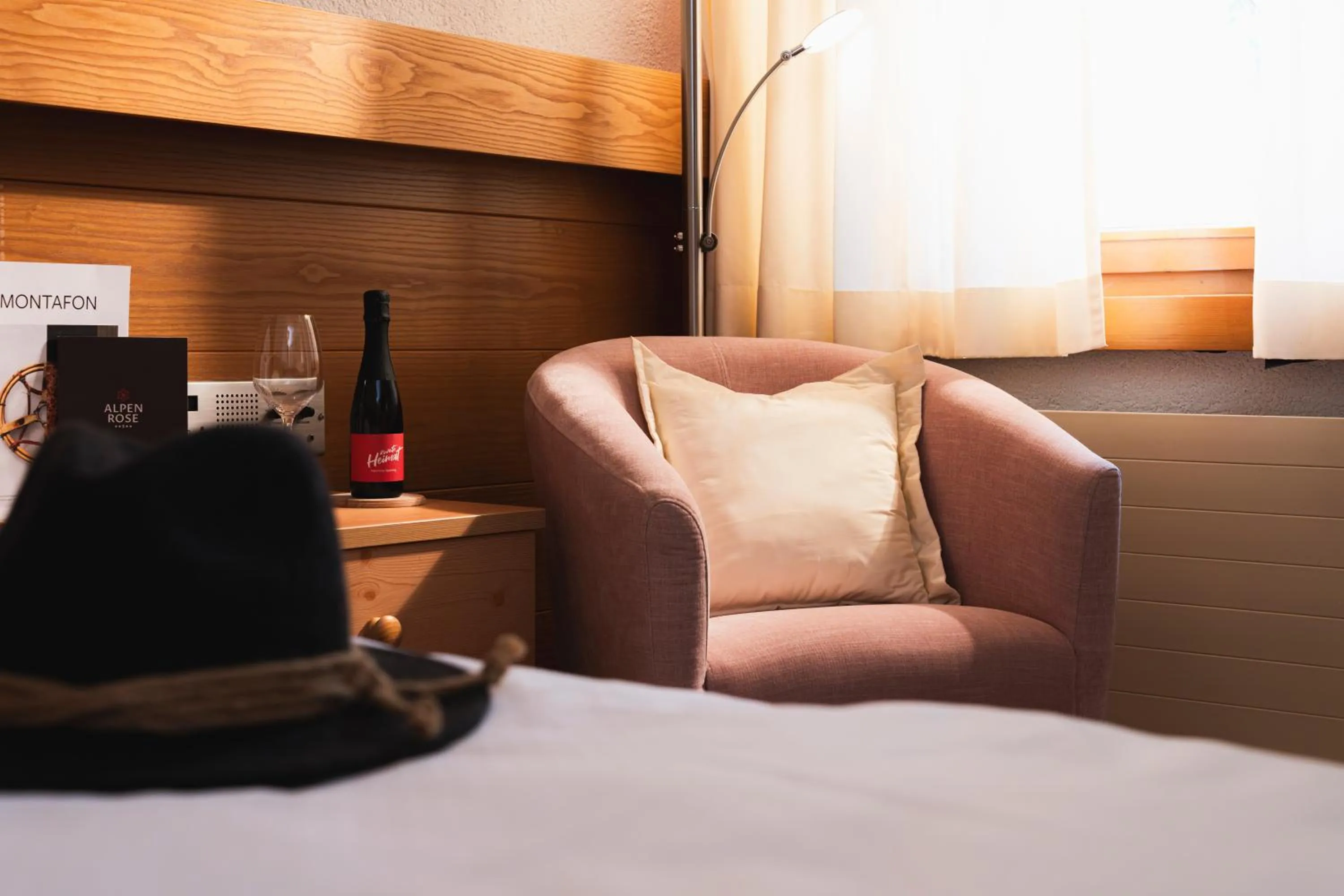 Seating area, Bed in Aktiv & Spa Hotel Alpenrose