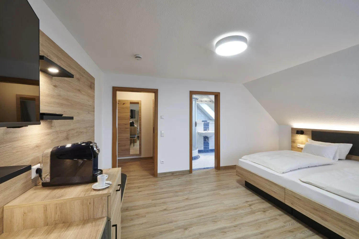 Photo of the whole room, Bed in Kreuz-Post Hotel-Restaurant-SPA