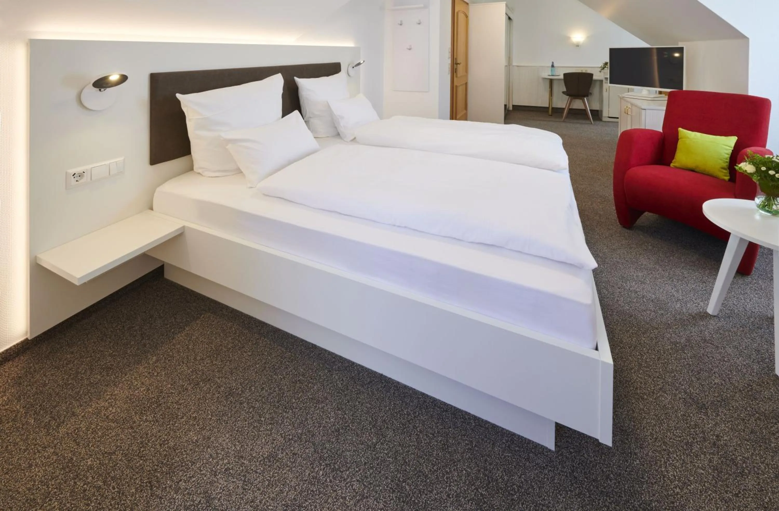 Photo of the whole room, Bed in Kreuz-Post Hotel-Restaurant-SPA