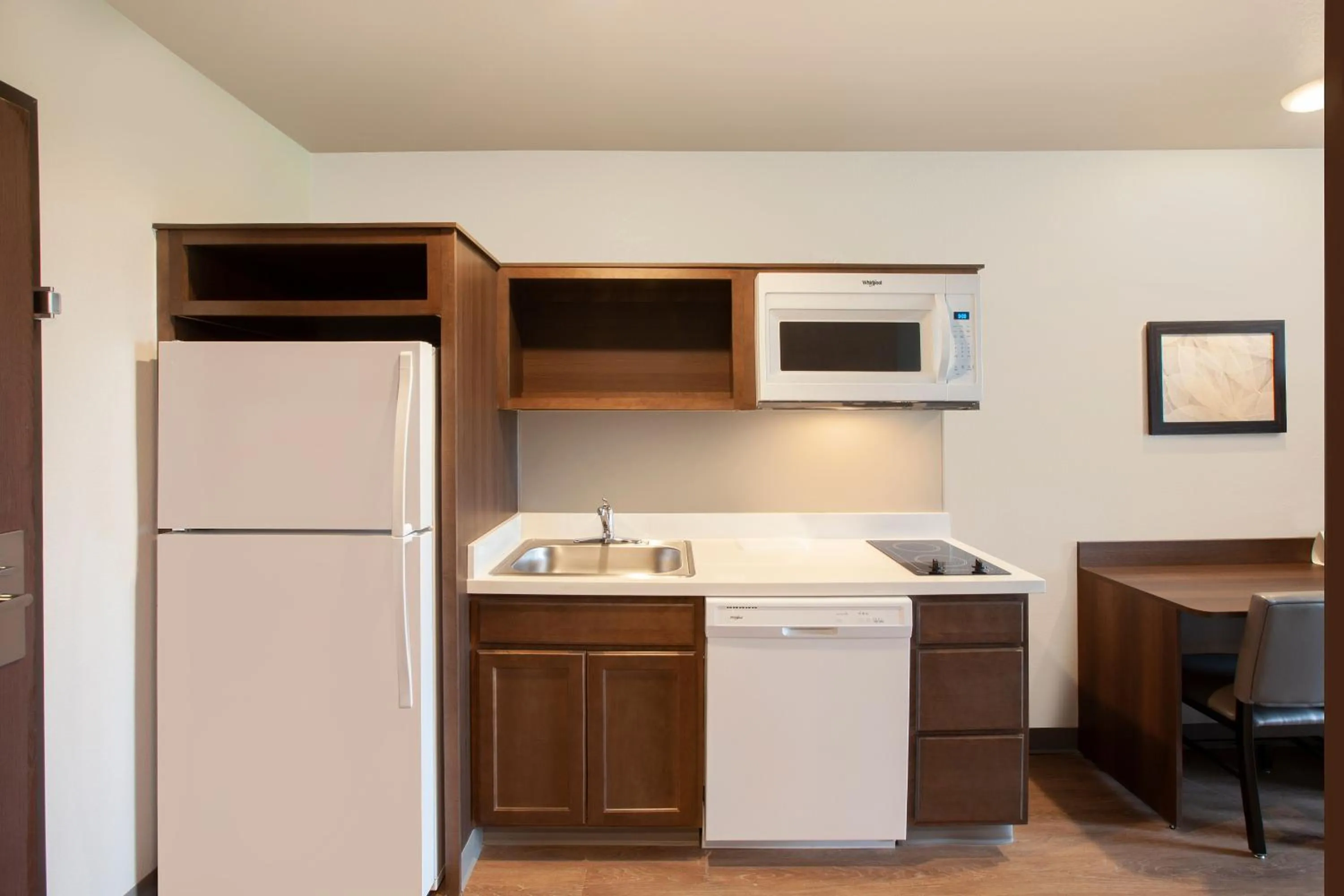 Kitchen or kitchenette in WoodSpring Suites Plano - North Dallas
