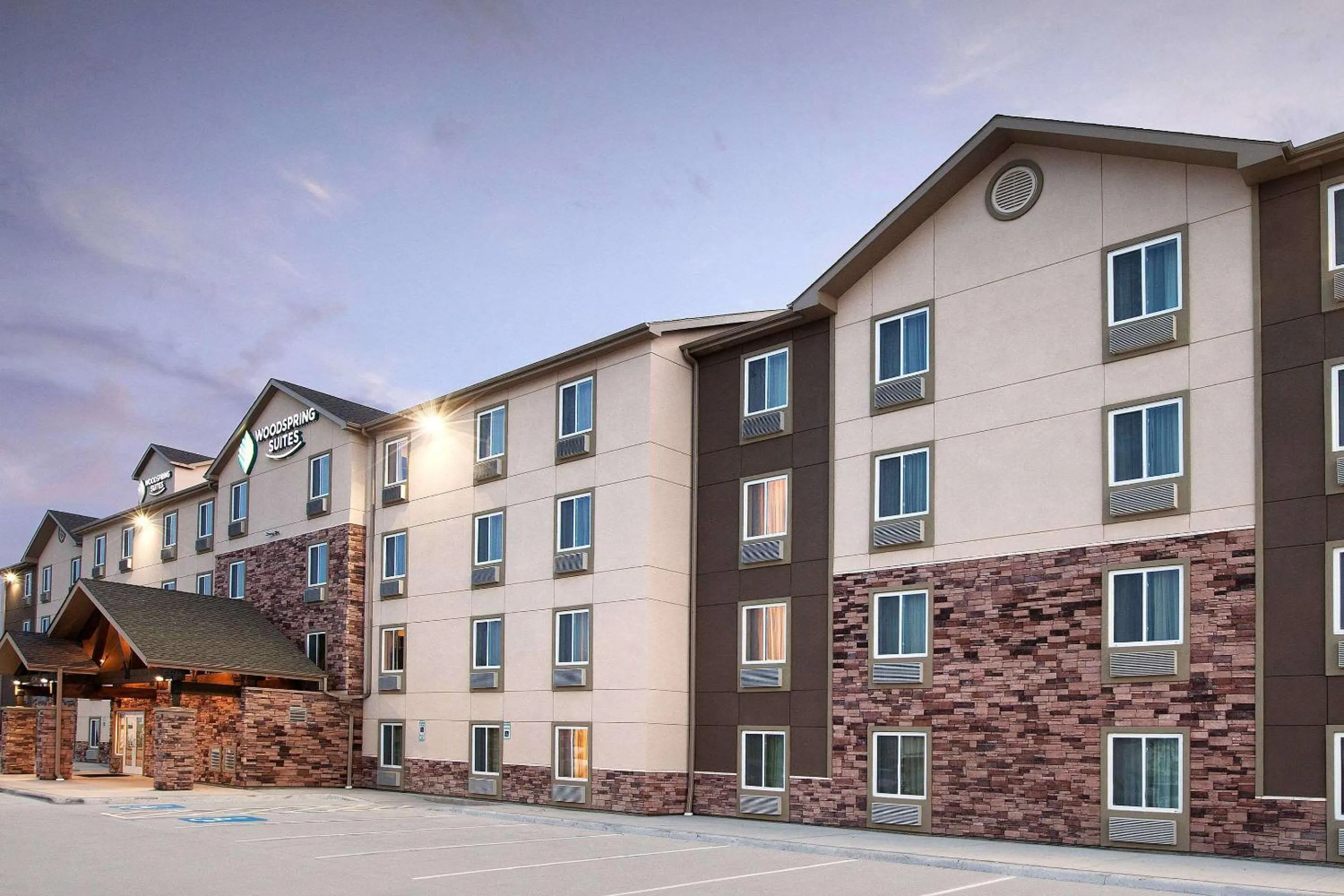Property building in WoodSpring Suites Plano - North Dallas