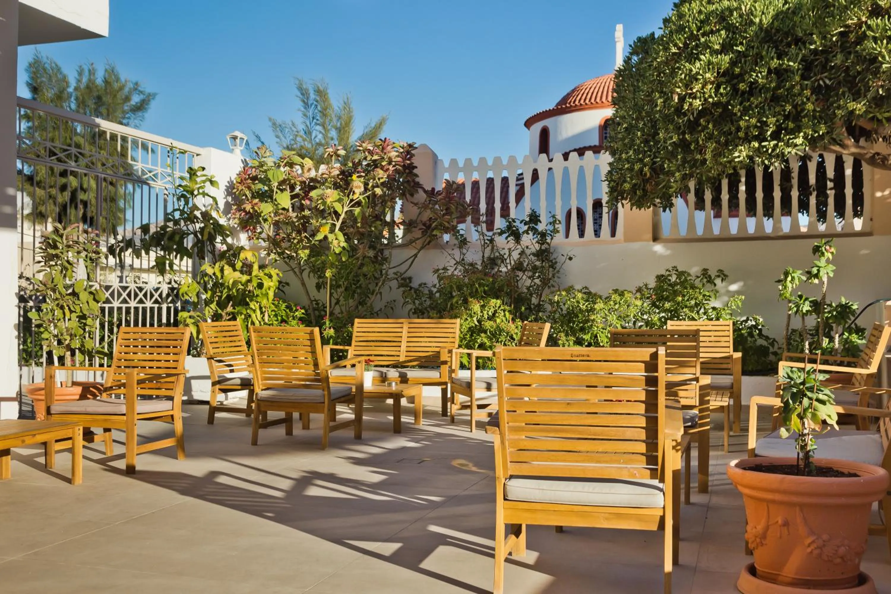 Garden in Regina Studios & Hotel