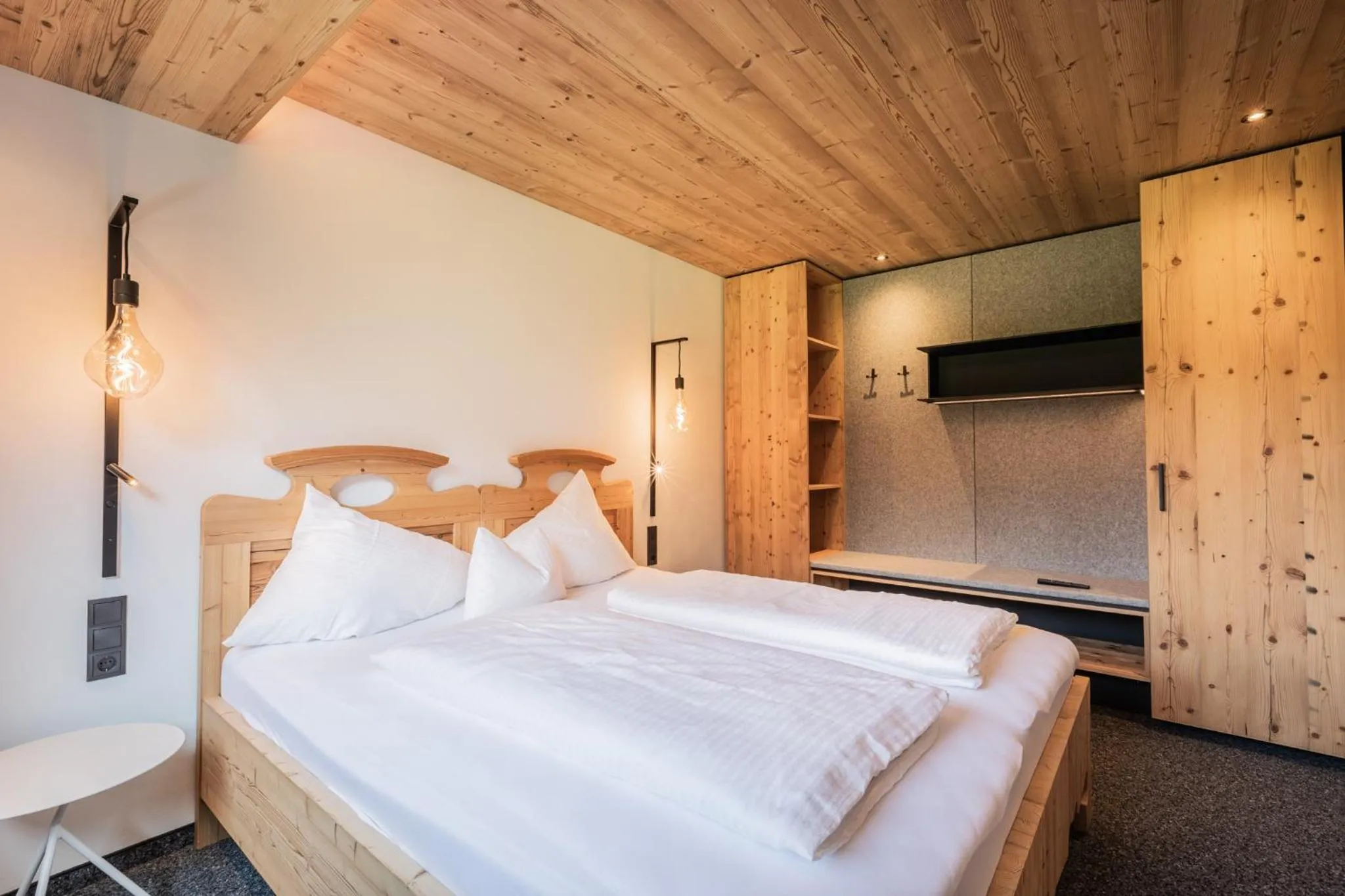 Bed in s'Hoamatl Dorfkrug Appartements