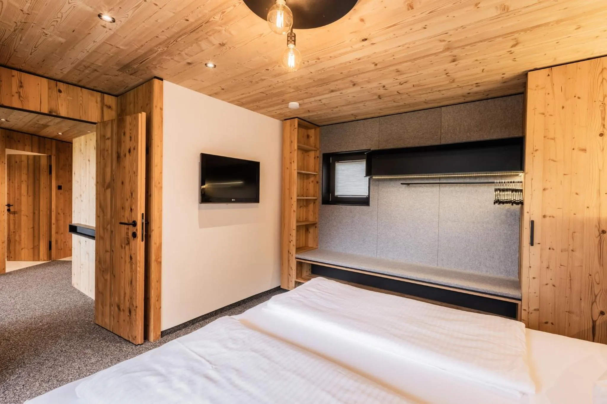 TV and multimedia, Bed in s'Hoamatl Dorfkrug Appartements