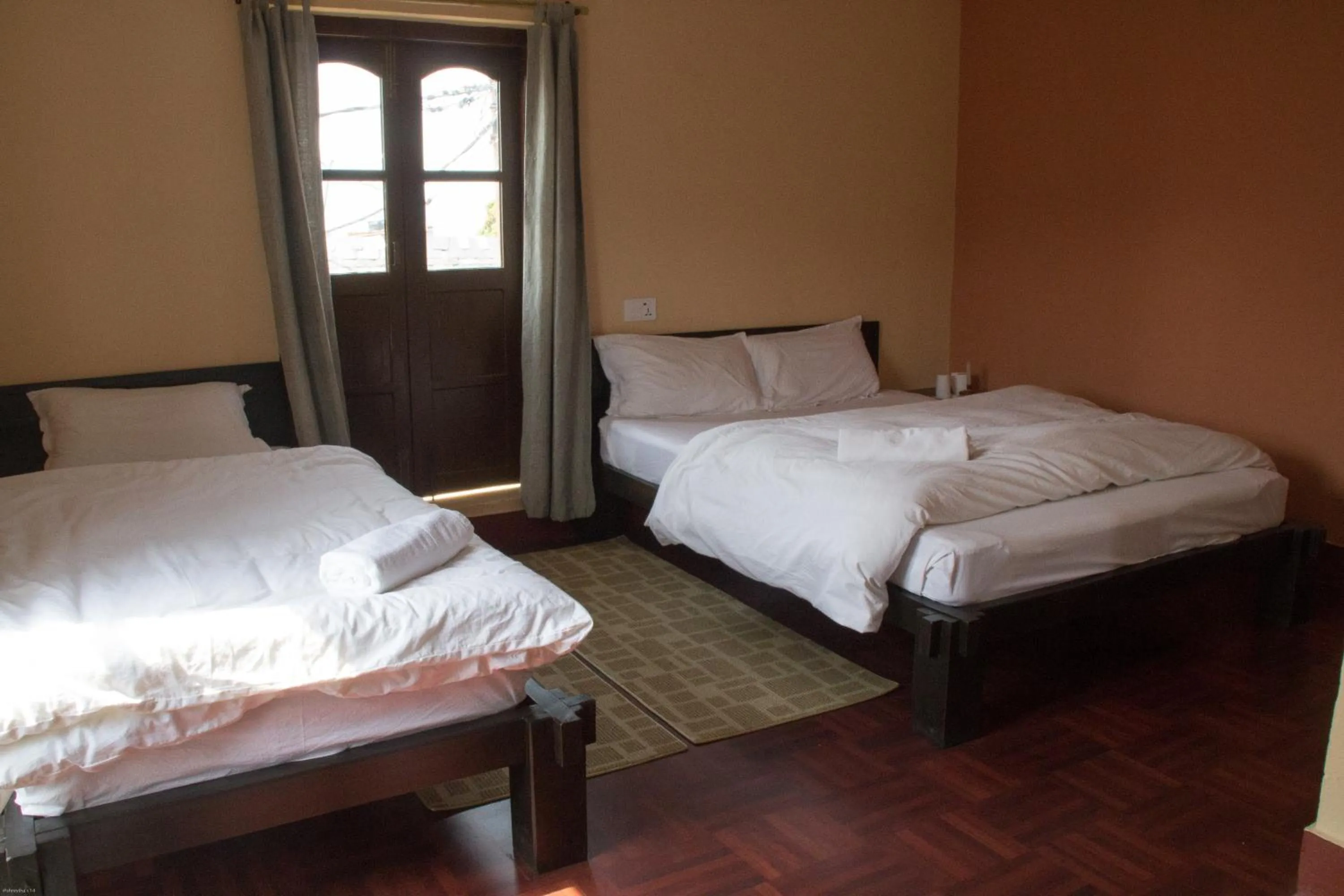 Bed in Bandipur Kaushi Inn