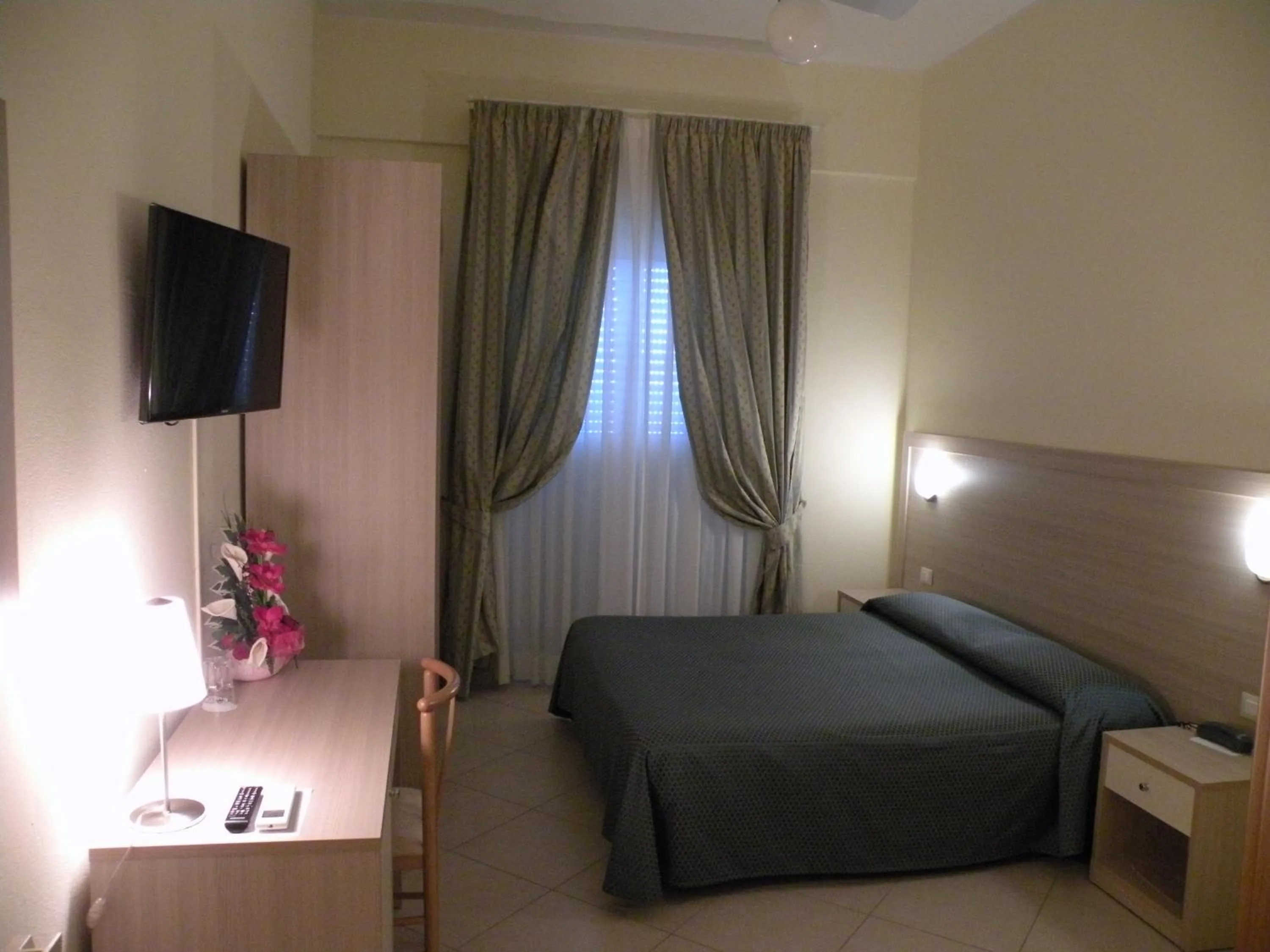 Bed in Hotel Parrini