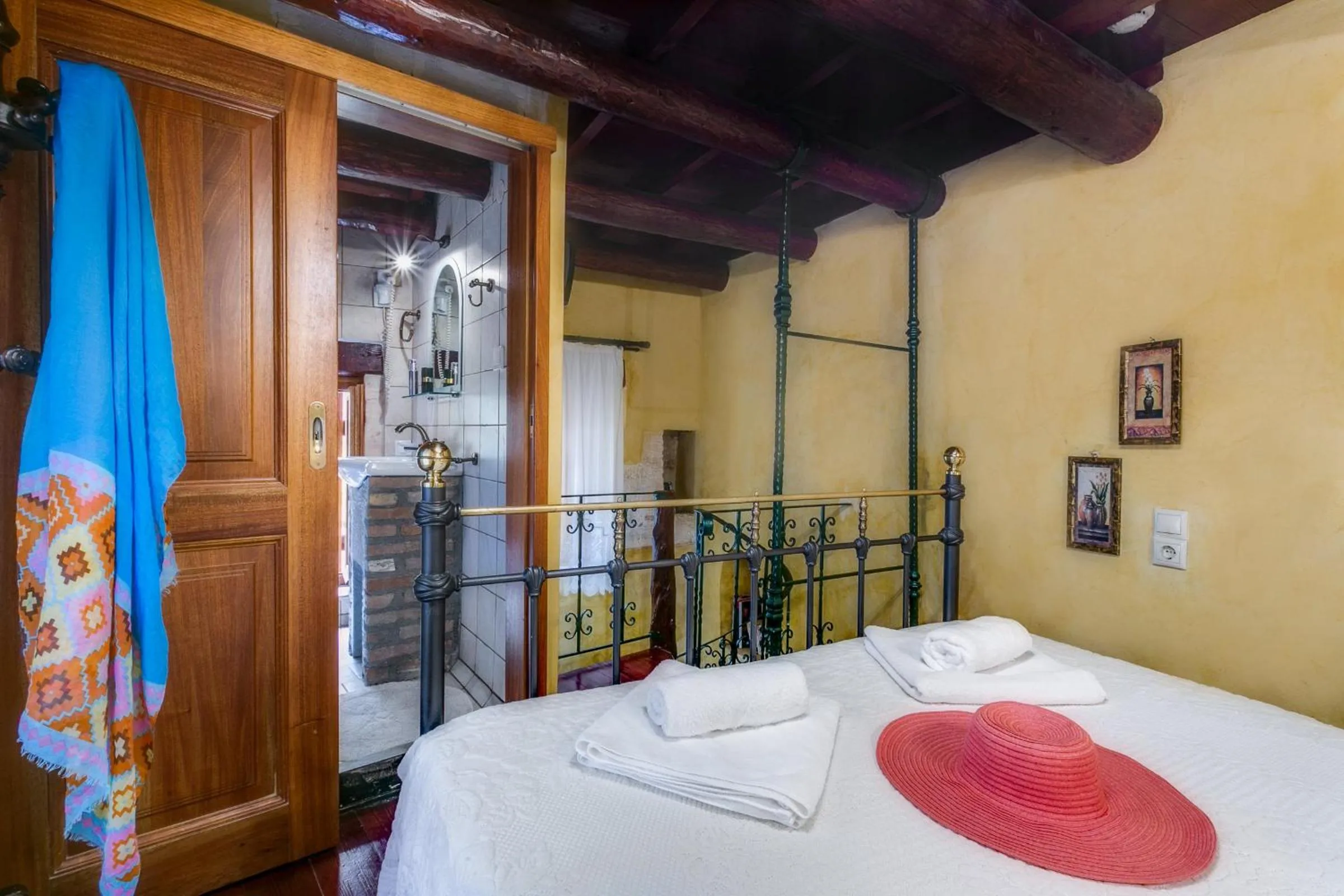 Bed in Ifigenia Rooms