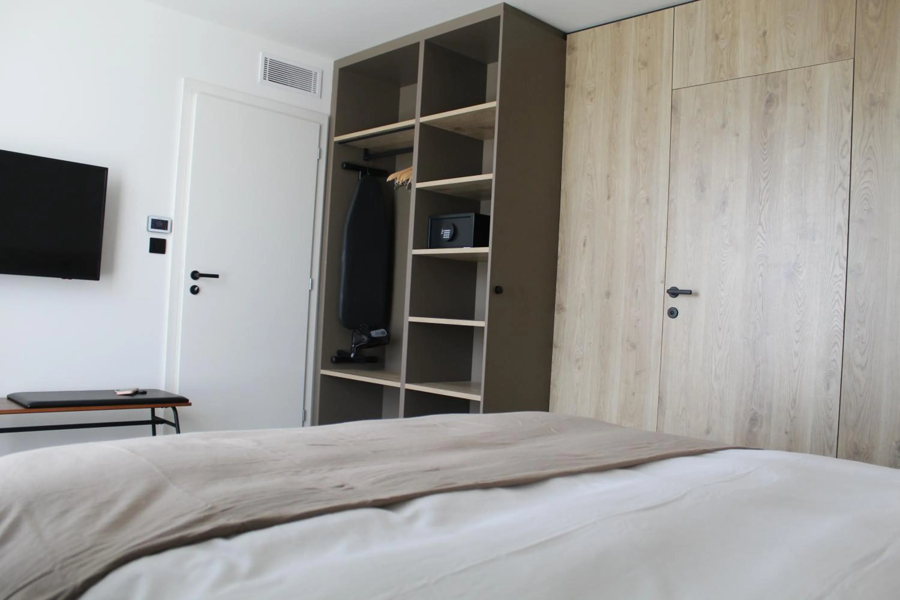 Bed in Hôtel Les Muses