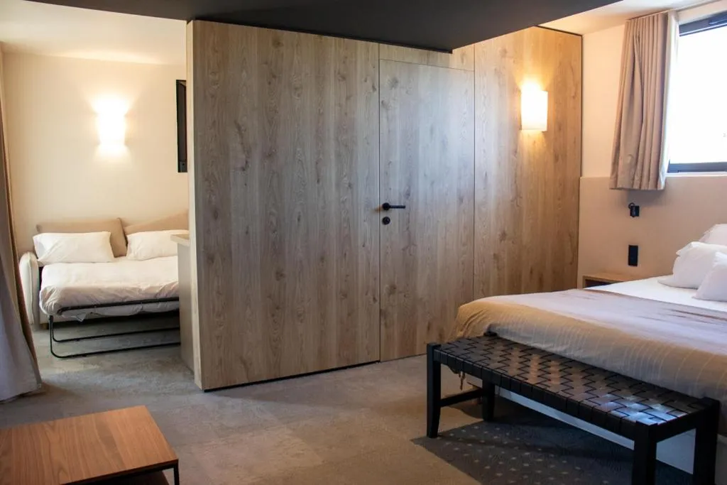 Bed in Hôtel Les Muses