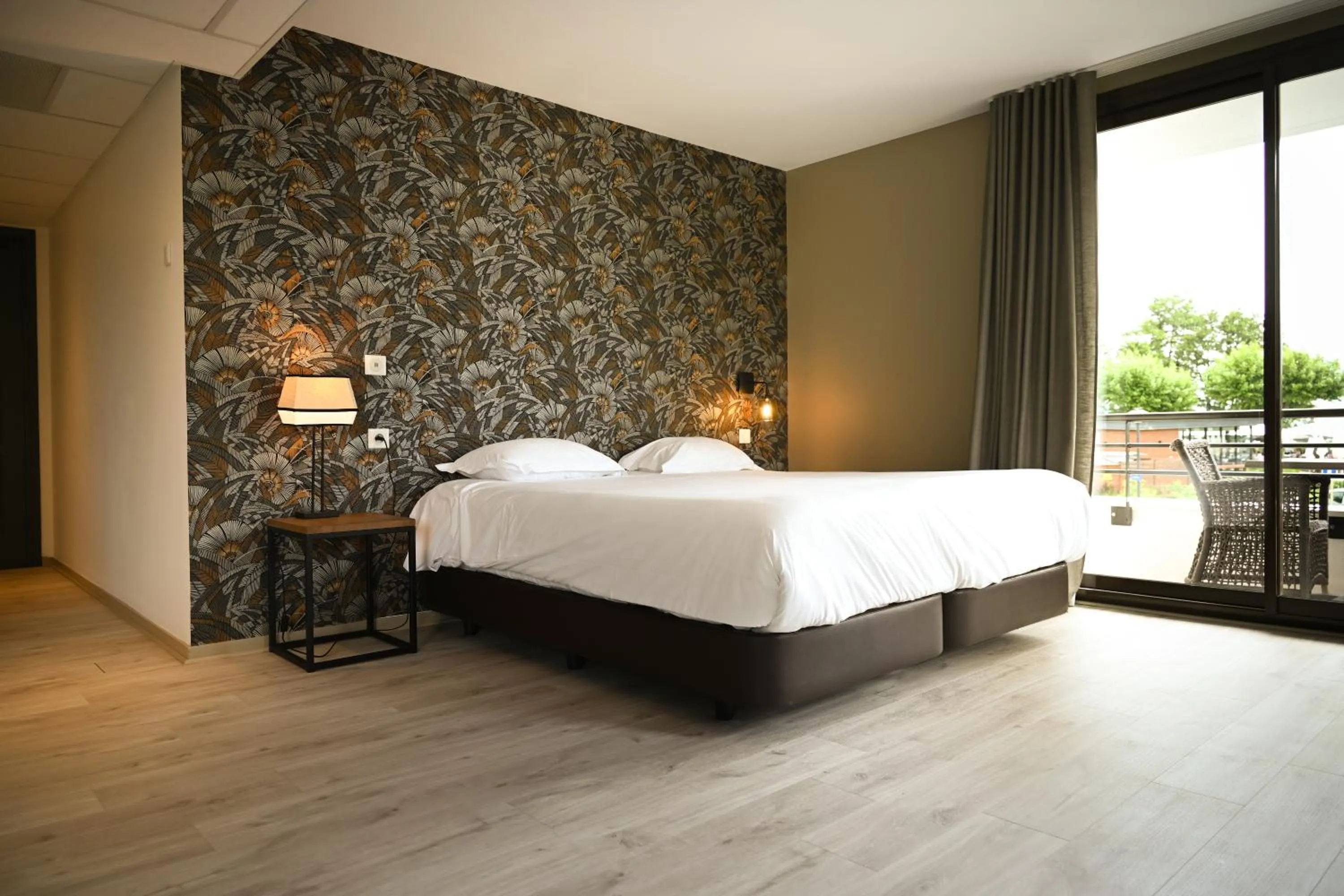 Bed in Hôtel Les Muses