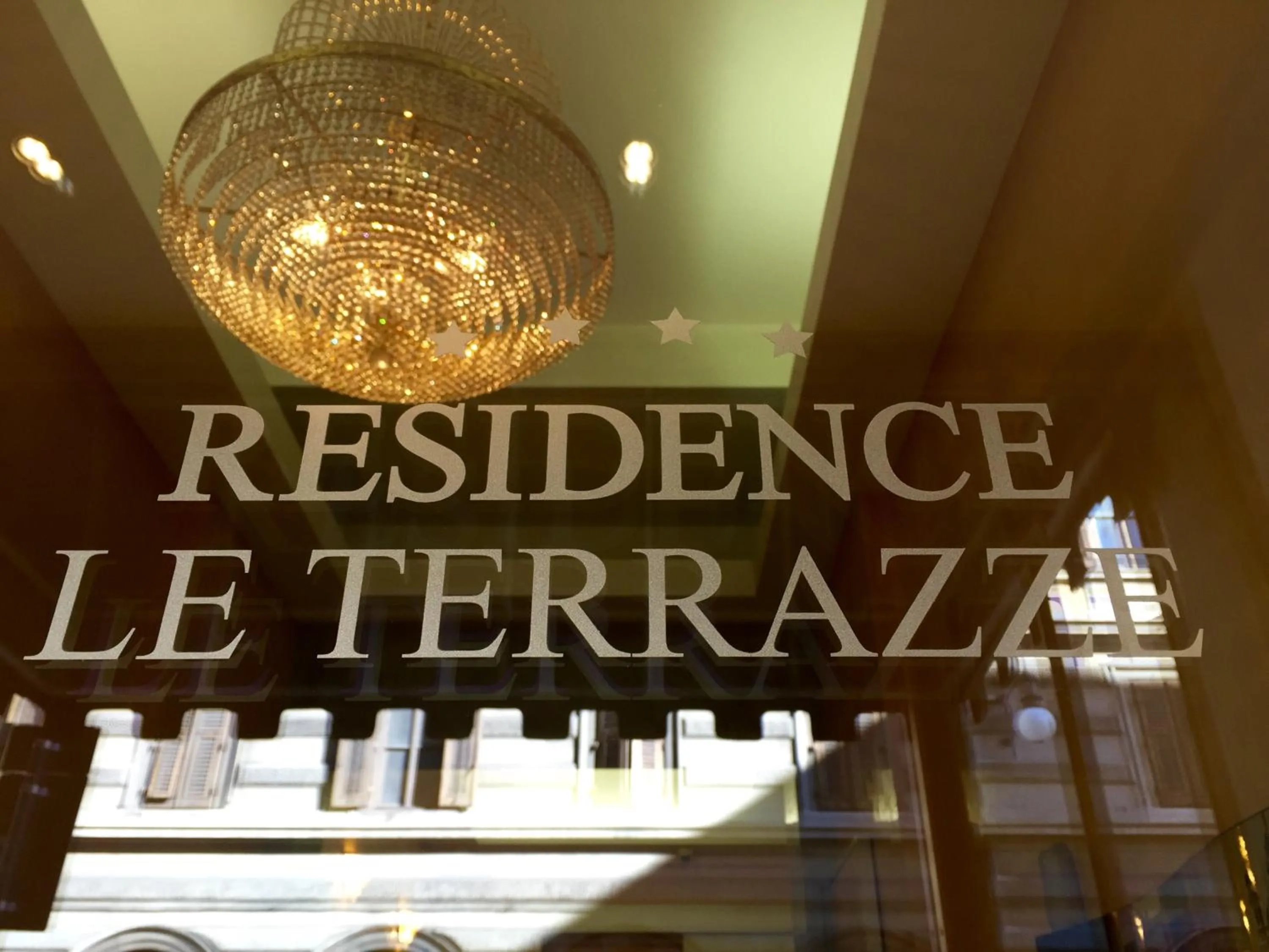 Property logo or sign in Residence Le Terrazze