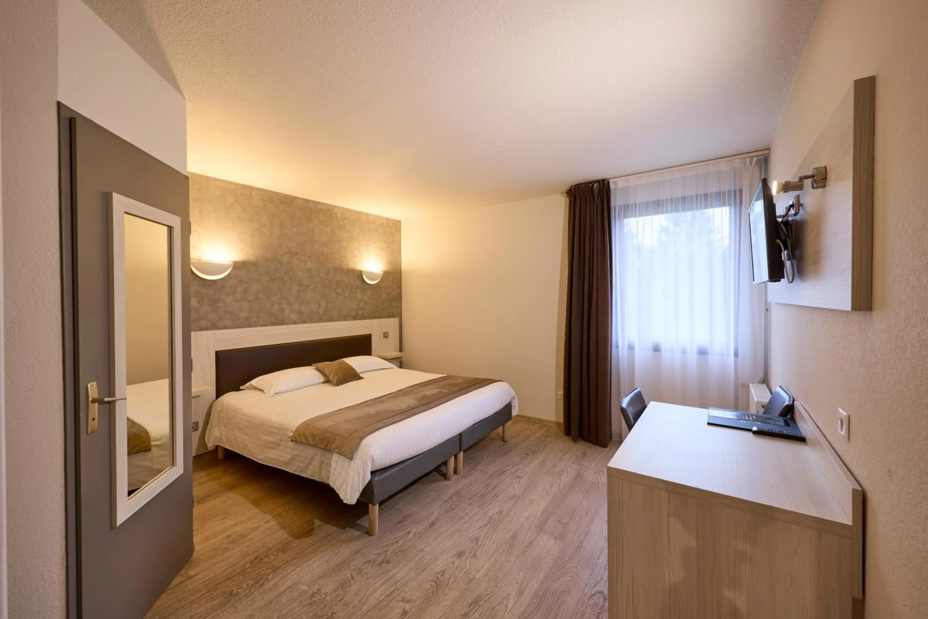 Bedroom, Bed in Hôtel-Restaurant Le Calice Du Gevaudan - A75