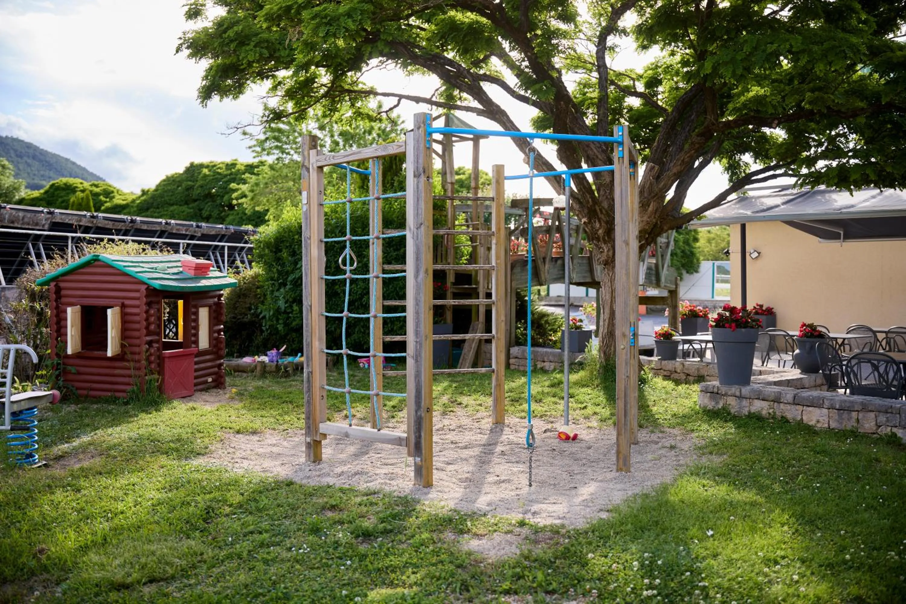 Children play ground in Hôtel-Restaurant Le Calice Du Gevaudan - A75