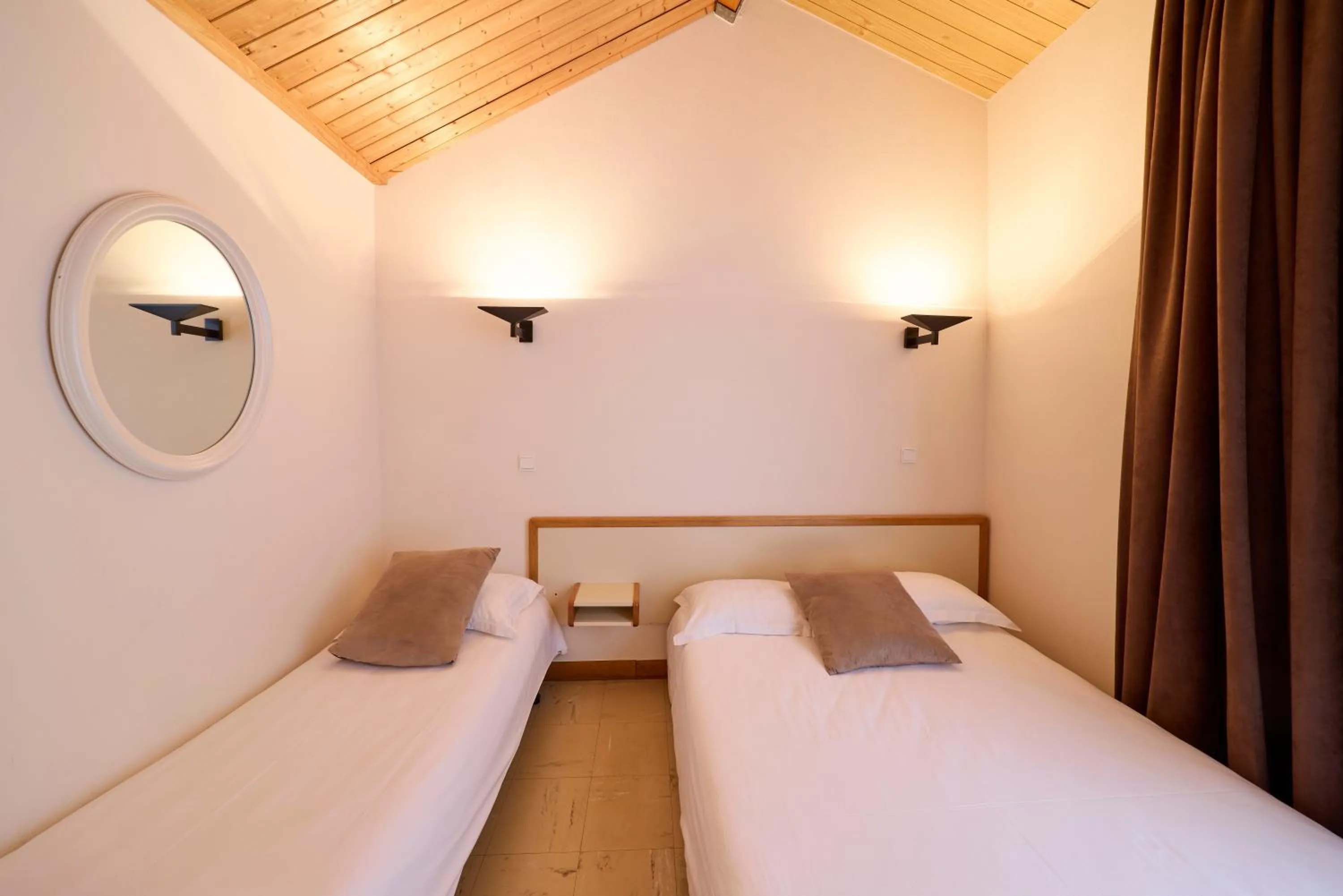 Photo of the whole room, Bed in Hôtel-Restaurant Le Calice Du Gevaudan - A75